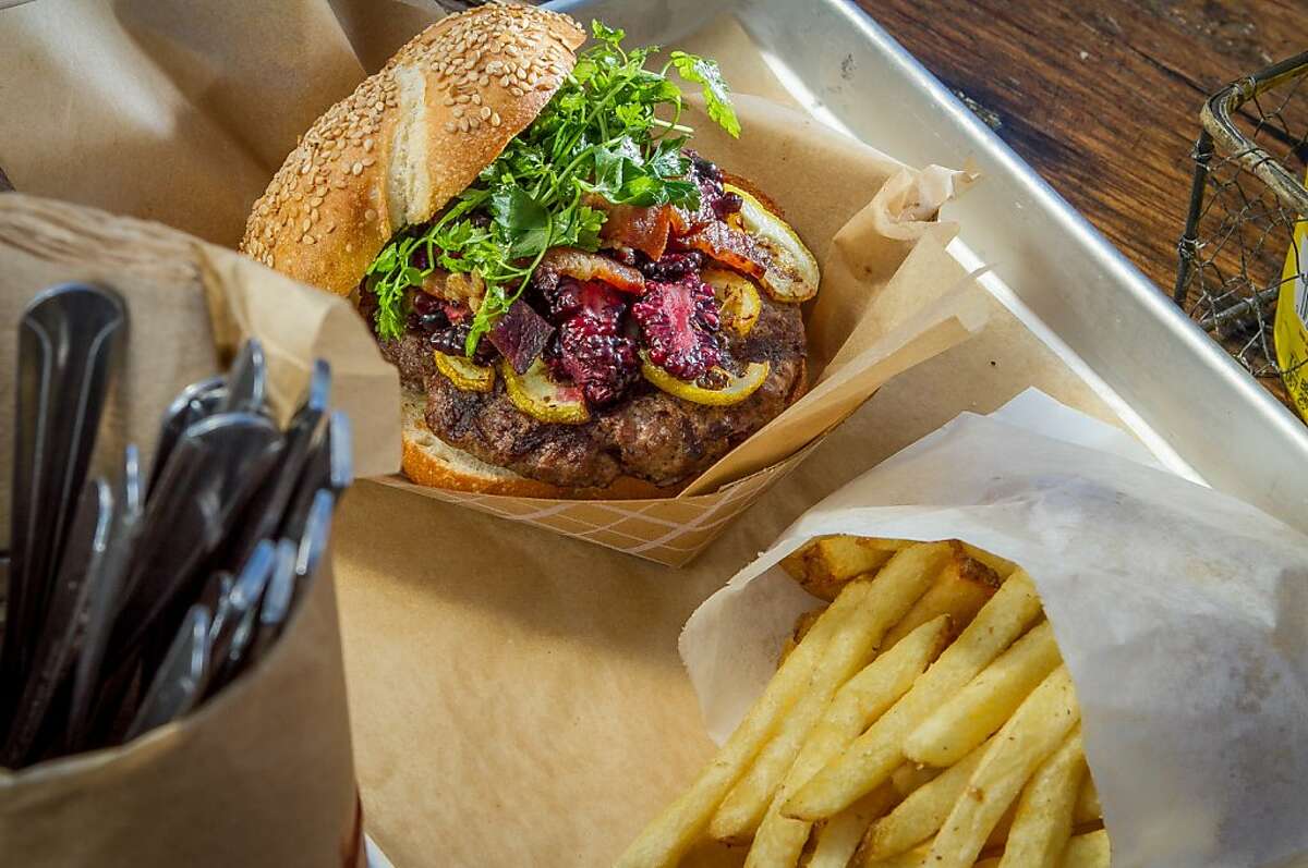 The Burger of the Week with Blackberries and Lemon with a side of Fries at Victory Burger in Oakland, Calif., is seen on Thursday, September 5th, 2013.