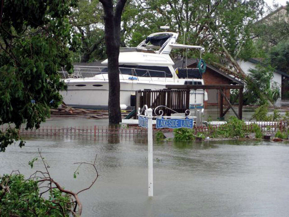 The storm pushed a lot of water into the bay. Almost everything on the north side of Clear Lake was flooded. The Classic Cafe had about 6 to 7 feet of water in it when I drove by. There was a sailboat floating in the parking lot behind the cafe. All bridges on NASA One had at least one boat resting against them. Photo: Charles Hulvey