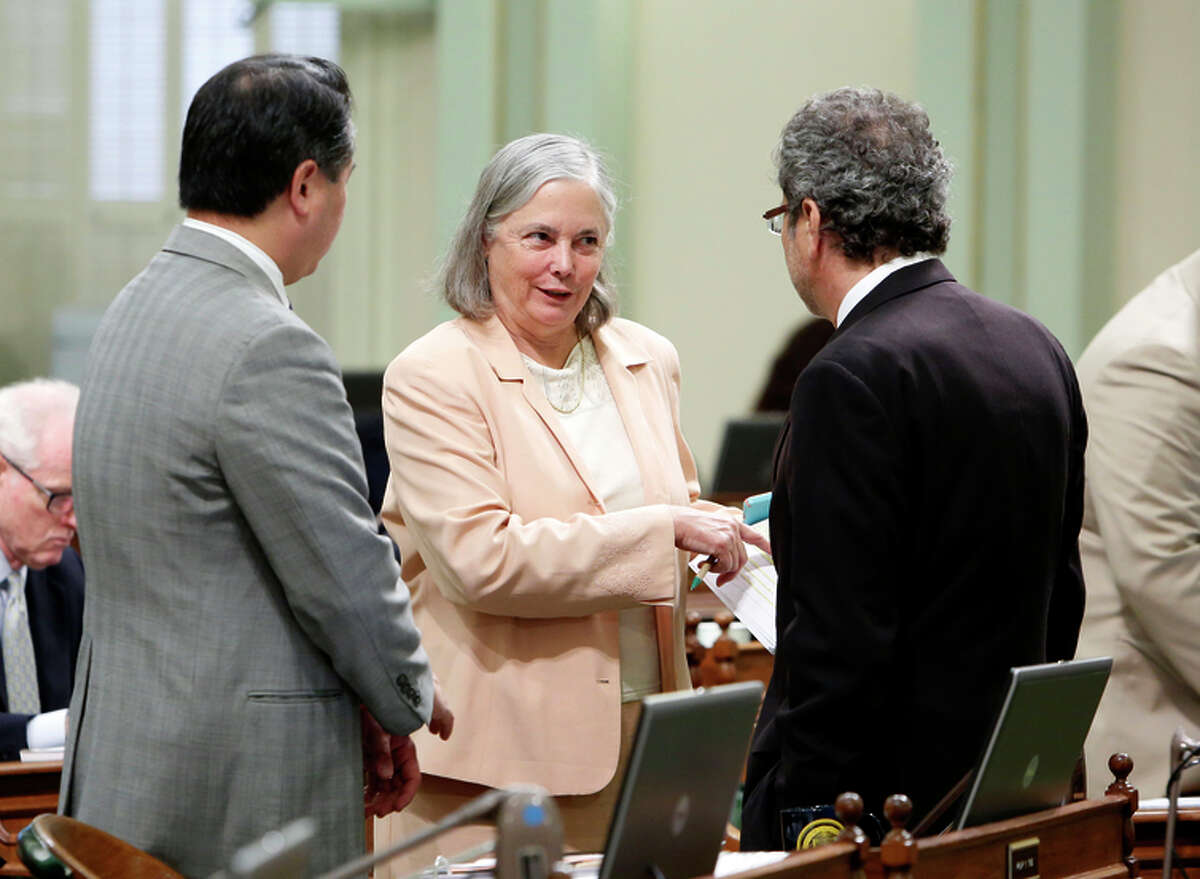 State Sen. Fran Pavley (center) talks with Assemblymen Phil Ting (left) and Richard Bloom.