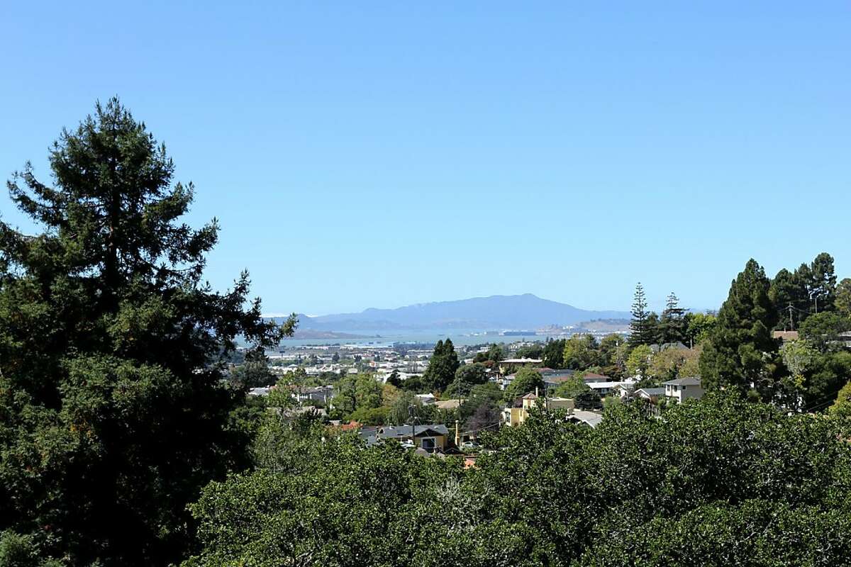 The Berkeley home looks out at a verdant landscape and nearby mountains.