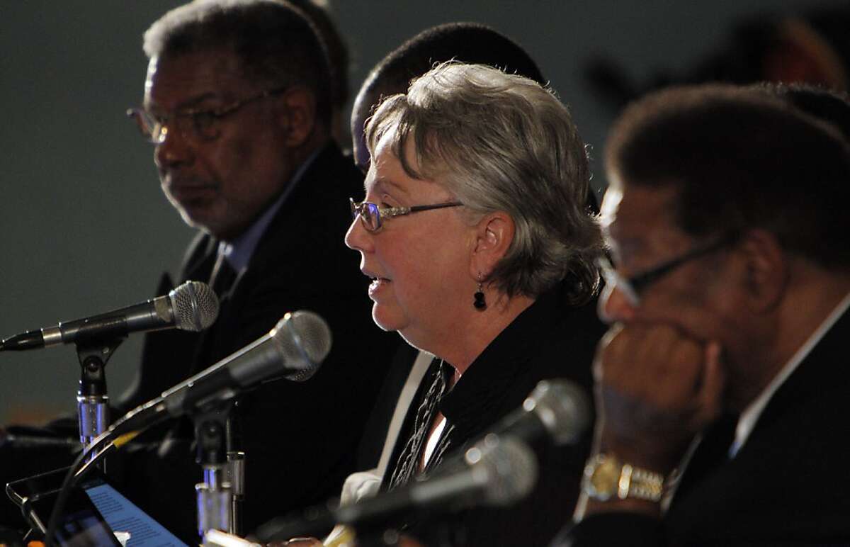 Richmond Mayor Gayle McLaughlin, flanked by Vice Mayor Corky Boozé, left, and Councilmember Nat Bates, right, addresses a speaker during a city council meeting on Tuesday, September 10, 2013, in Richmond, Calif.