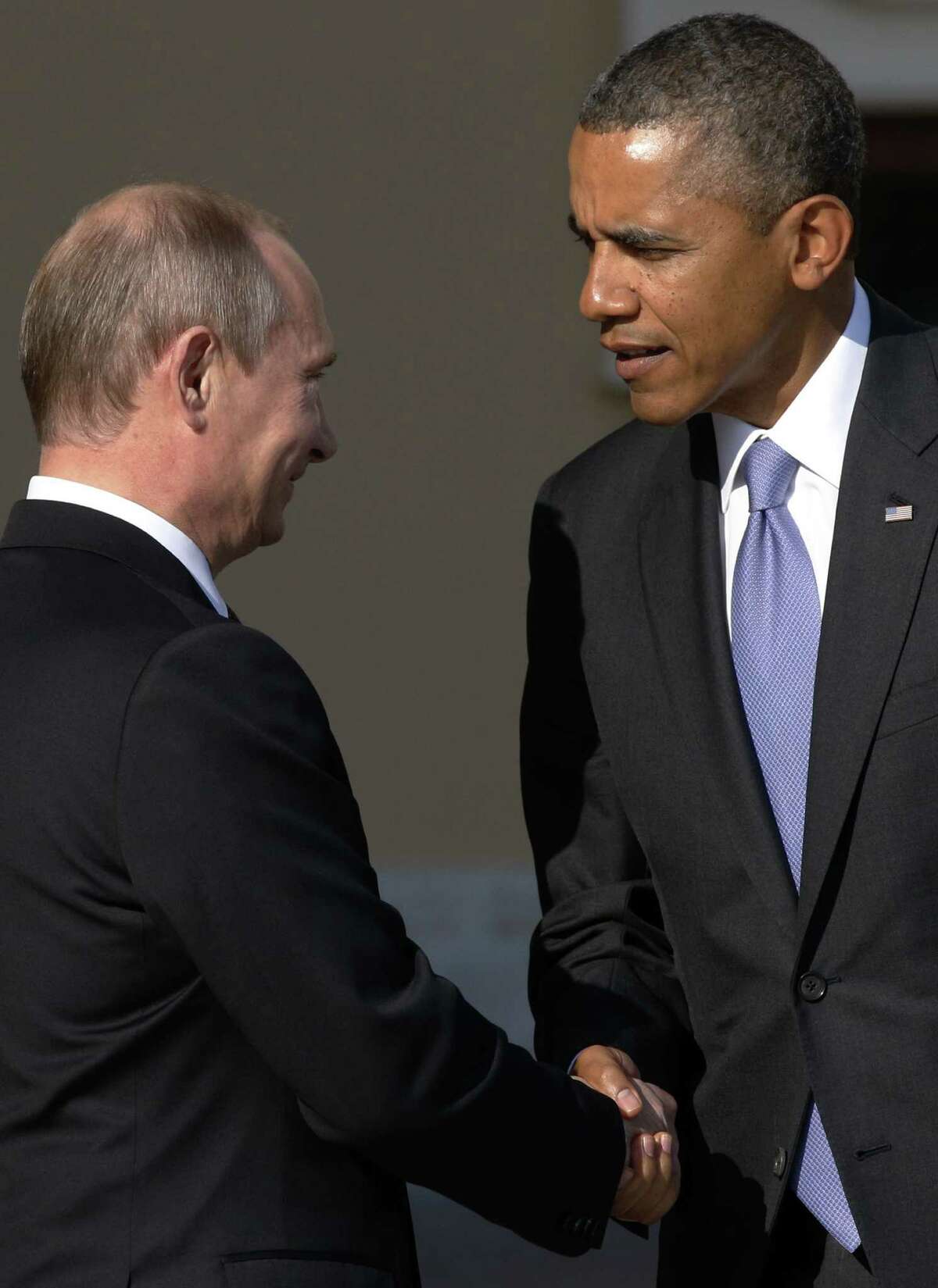 In a happier moment earlier this month, President Vladimir Putin greets President Barack Obama as the American arrived for the G-20 meeting in St. Petersburg, Russia. The White House now is upset with Putin's opinion piece on Syria in the New York Times.