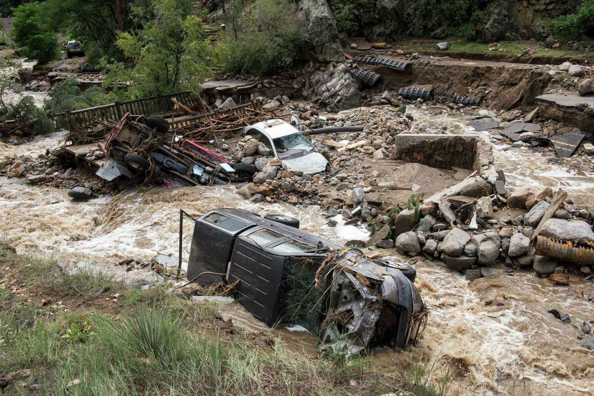 This Sept. 13, 2013 photo provided by Earth Vision Trust shows destruction on Gold Run Creek north of Boulder, Colo., on Sept. 13, 2013. The destructive force took out many homes, cars, trees, and completely washed out Gold Run Road. By air and by land, the rescue of hundreds of Coloradoans stranded by epic mountain flooding accelerated Saturday as debris-filled rivers became muddy seas that extended into towns and farms miles from the Rockies. (AP Photo/Matthew Kennedy, Earth Vision Trust) ORG XMIT: COMK101