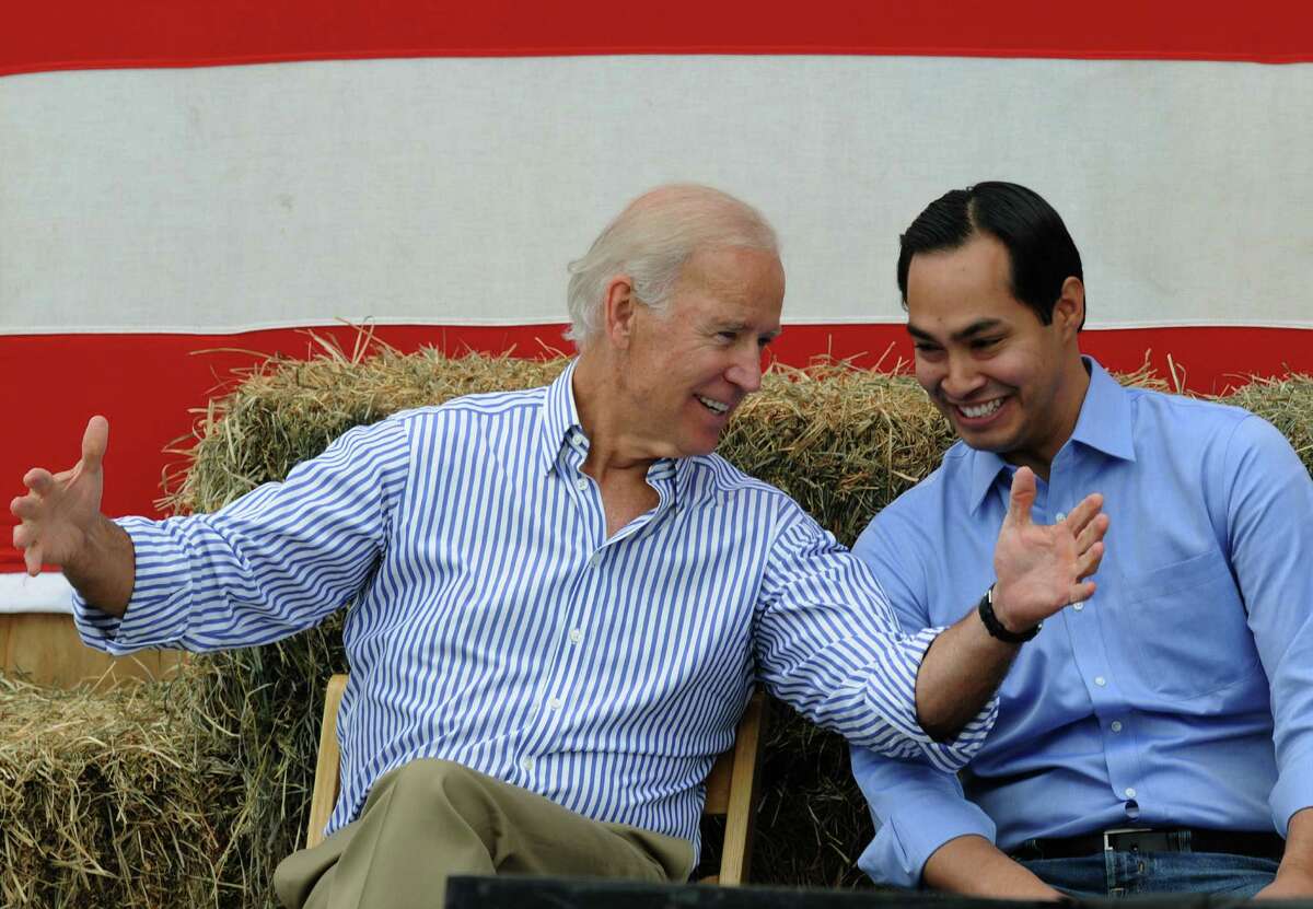 Vice President Joe Biden (R) and San Antonio Mayor Julian Castro share a moment onstage at the 36th Annual Harkin Steak Fry on September 15, 2013 in Indianola, Iowa. Sen. Harkin's Democratic fundraiser is one of the largest in Iowa each year.