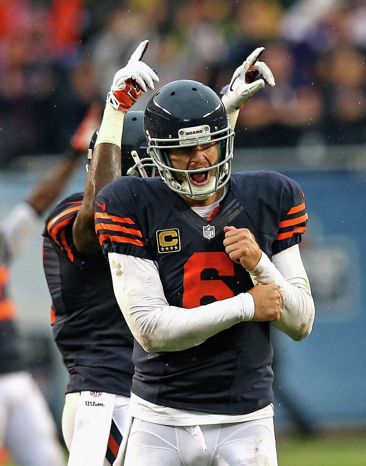 CHICAGO, IL - SEPTEMBER 15: Jay Cutler #6 and Alshon Jeffery #17 of the Chicago Bears celebrate the game-winning extra point against the Minnesota Vikings at Soldier Field on September 15, 2013 in Chicago, Illinois. The Bears defeated the Vikings 31-30.