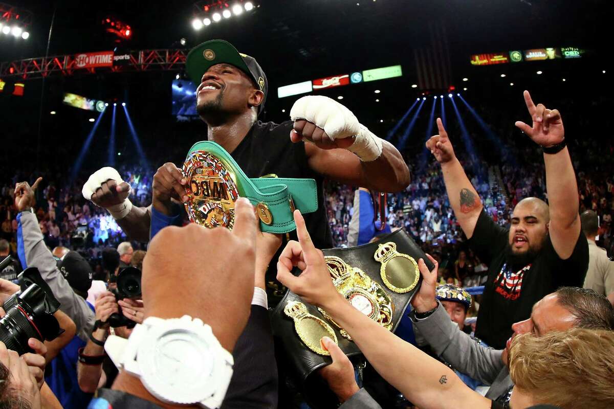 Floyd Mayweather Jr. improved to 45-0 after his majority decision over Saul “Canelo” Alvarez on Saturday in Las Vegas.