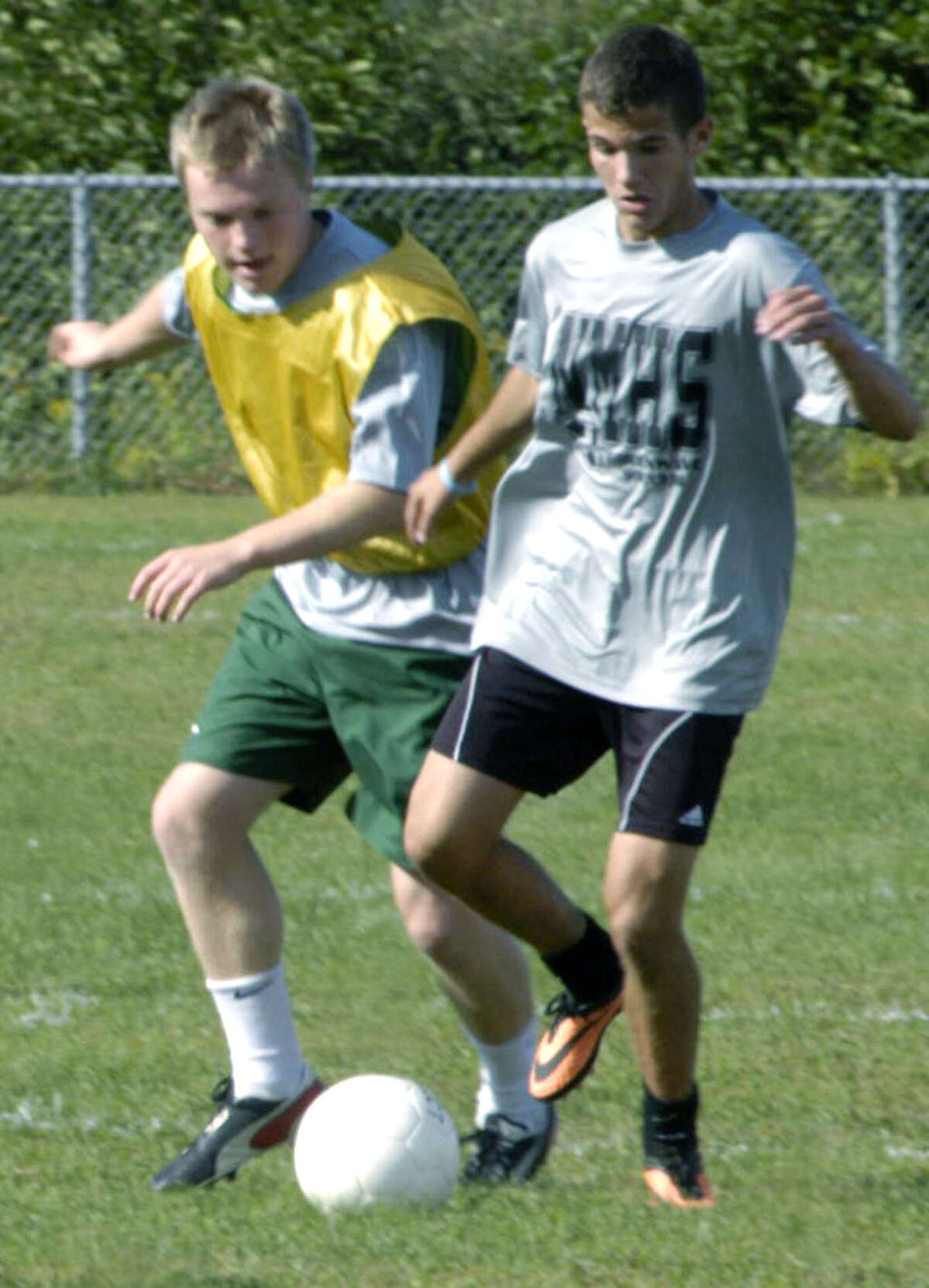 Green Wave players compete during pre-season practice for New Milford High School boys' soccer. September 2013