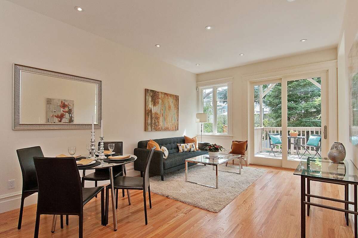 Eureka Valley condo has two levels, period details