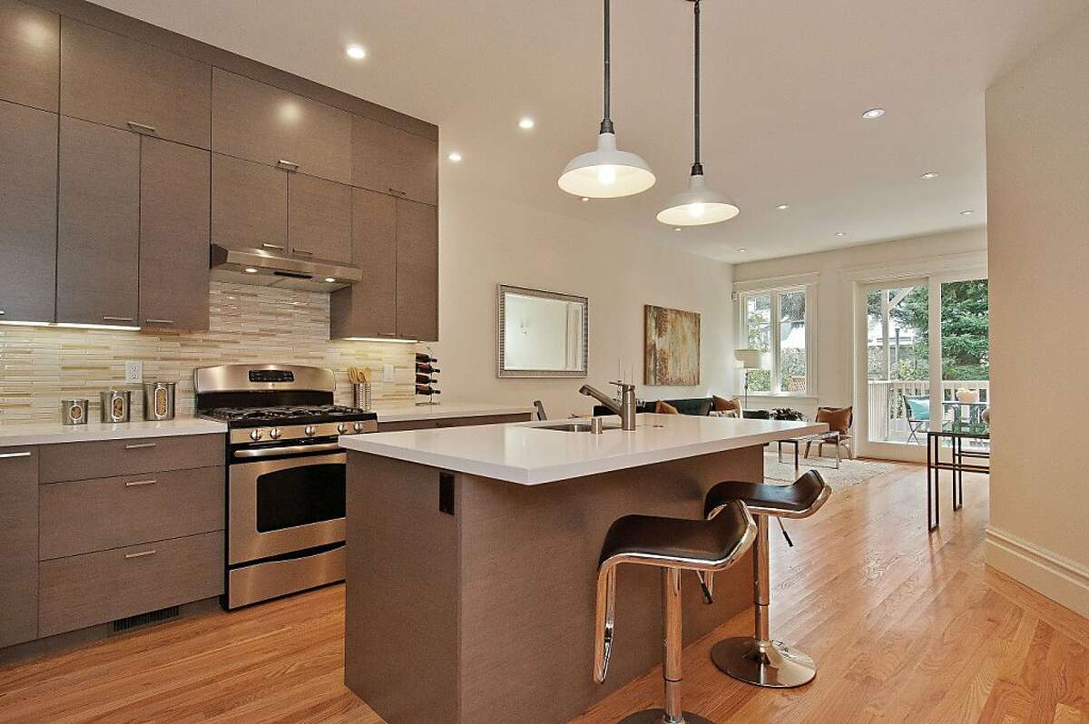 Eureka Valley condo has two levels, period details