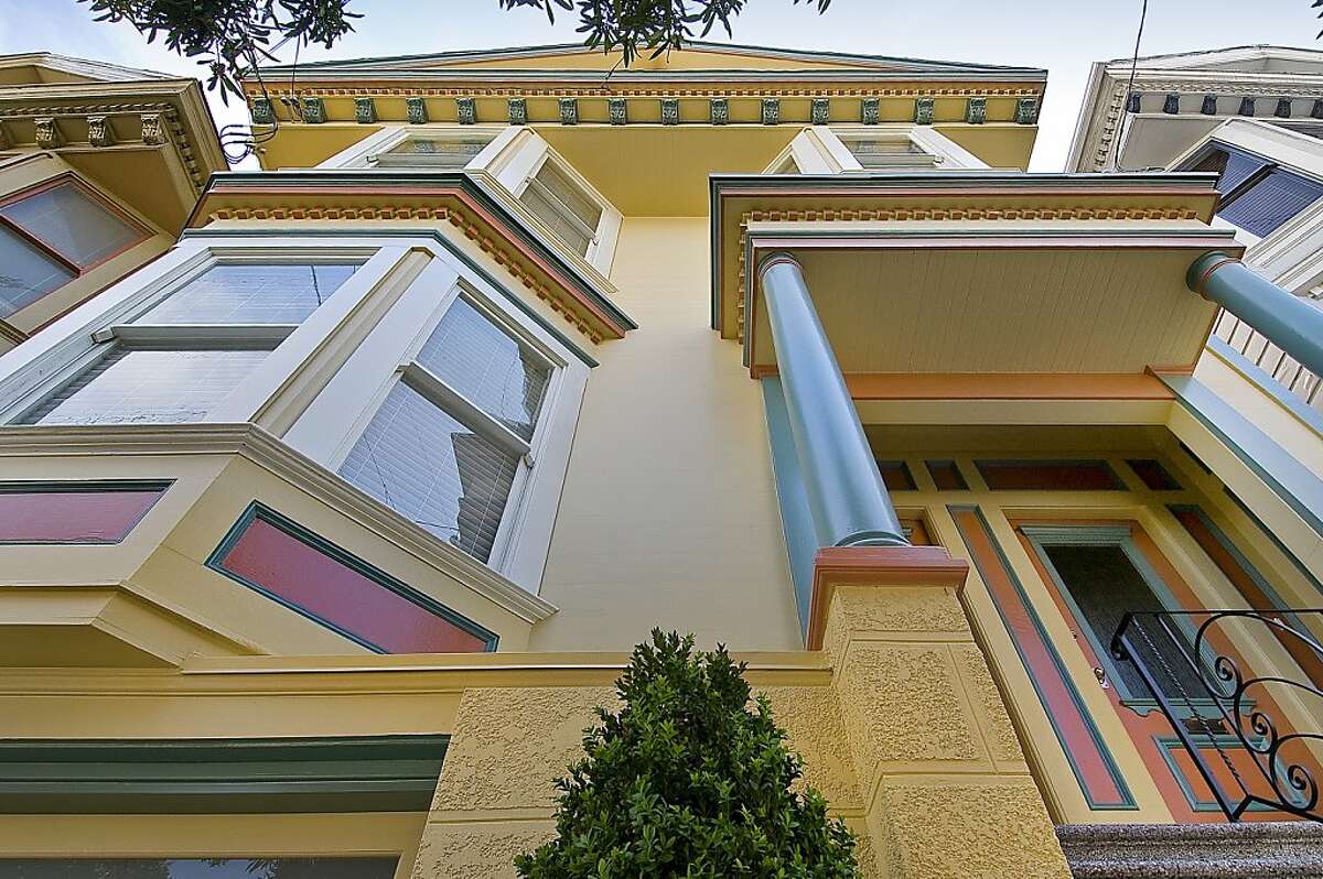 Eureka Valley condo has two levels, period details