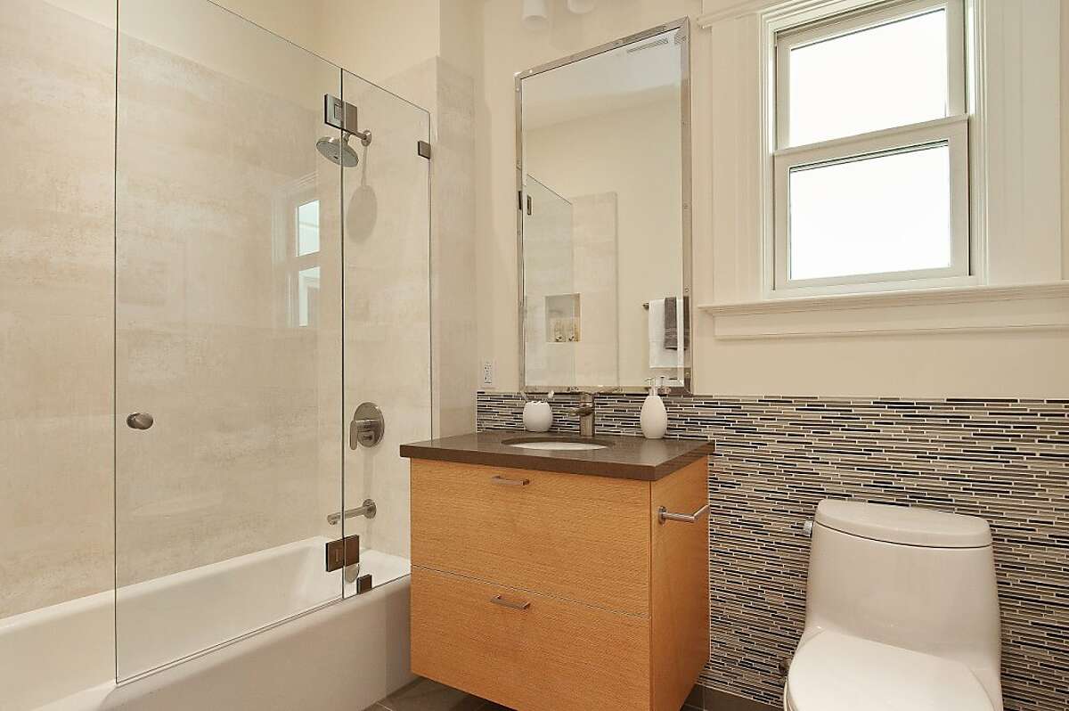 Eureka Valley condo has two levels, period details