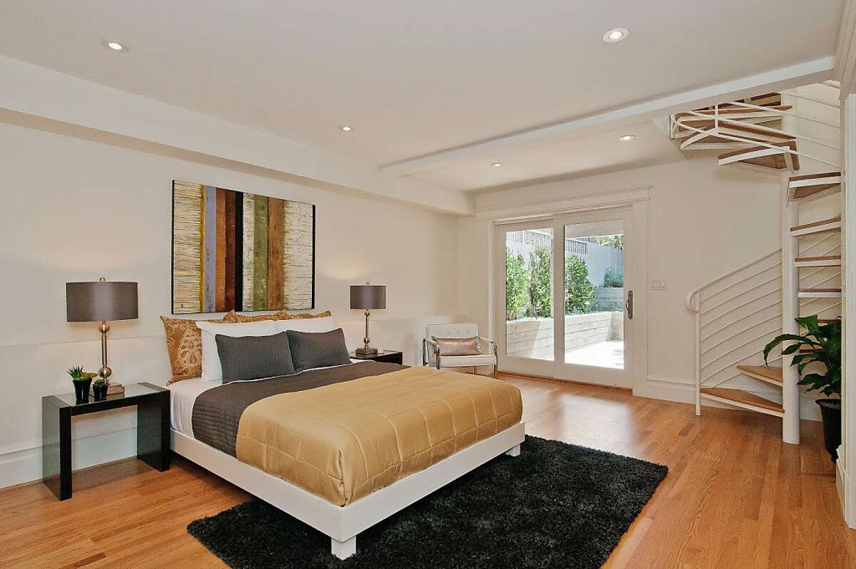 Eureka Valley condo has two levels, period details