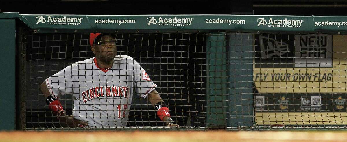 PHOTOS: Astros players' contract situation during offseason  Cincinnati Reds manager Dusty Baker (12) watches the game from the dugout during the fourth inning of an MLB game at Minute Maid Park, Wednesday, Sept. 18, 2013, in Houston. >>>Browse through the photos for a look at the contract situation for each Houston Astros player during this offseason ... 