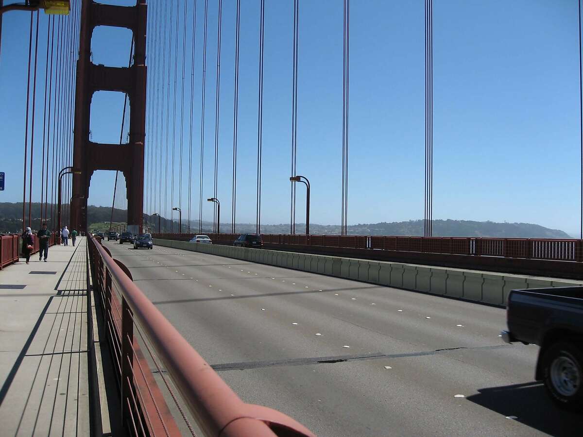 A digitally enhanced photograph shows details of what the Golden Gate Bridge District?•s proposed moveable lane barrier would look like when installed between the span?•s northbound and southbound lanes. The safety measure to prevent head-on crashes has been in the works for years and officials now say it will be installed sometime in 2014.
