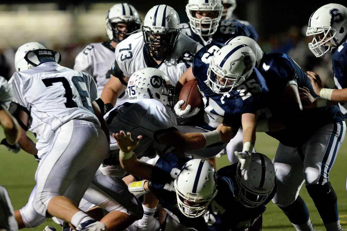 Staples football holds off Wilton