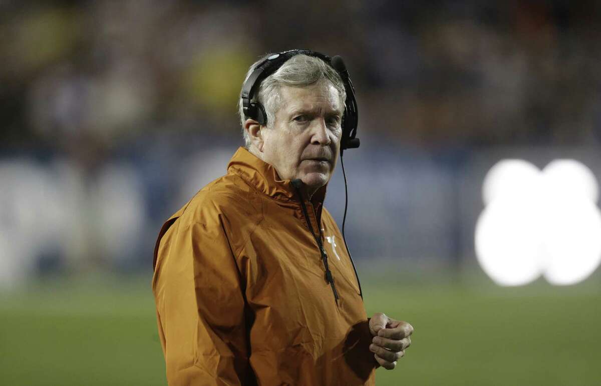 Texas head coach Mack Brown looks on in the second quarter during an NCAA college football game against Brigham Young Saturday, Sept. 7, 2013, in Provo, Utah. (AP Photo/Rick Bowmer)