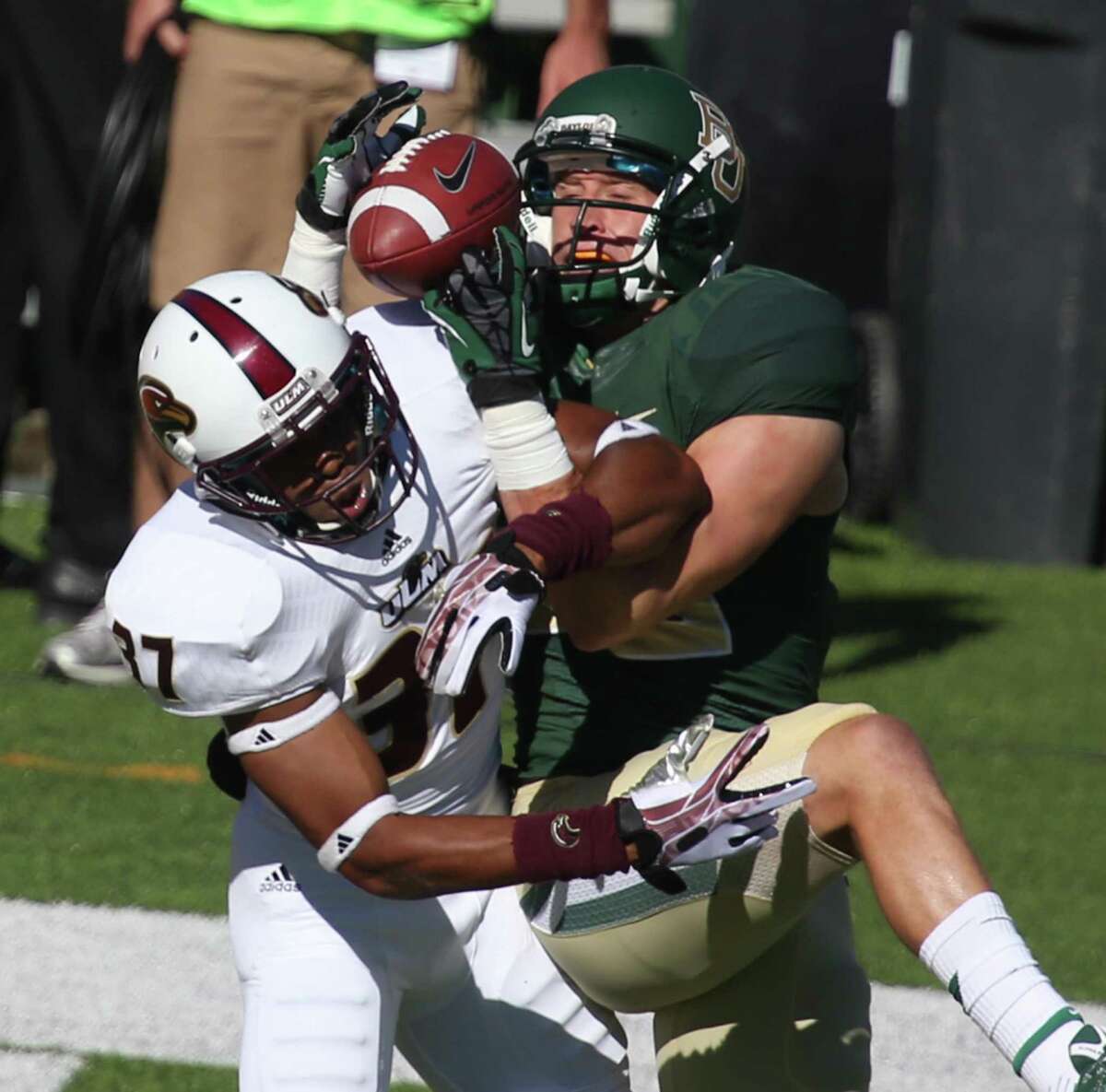 Baylor's Clay Fuller, who's from Smithson Valley, pulls in a TD over Louisiana-Monroe's Preston Coleman.