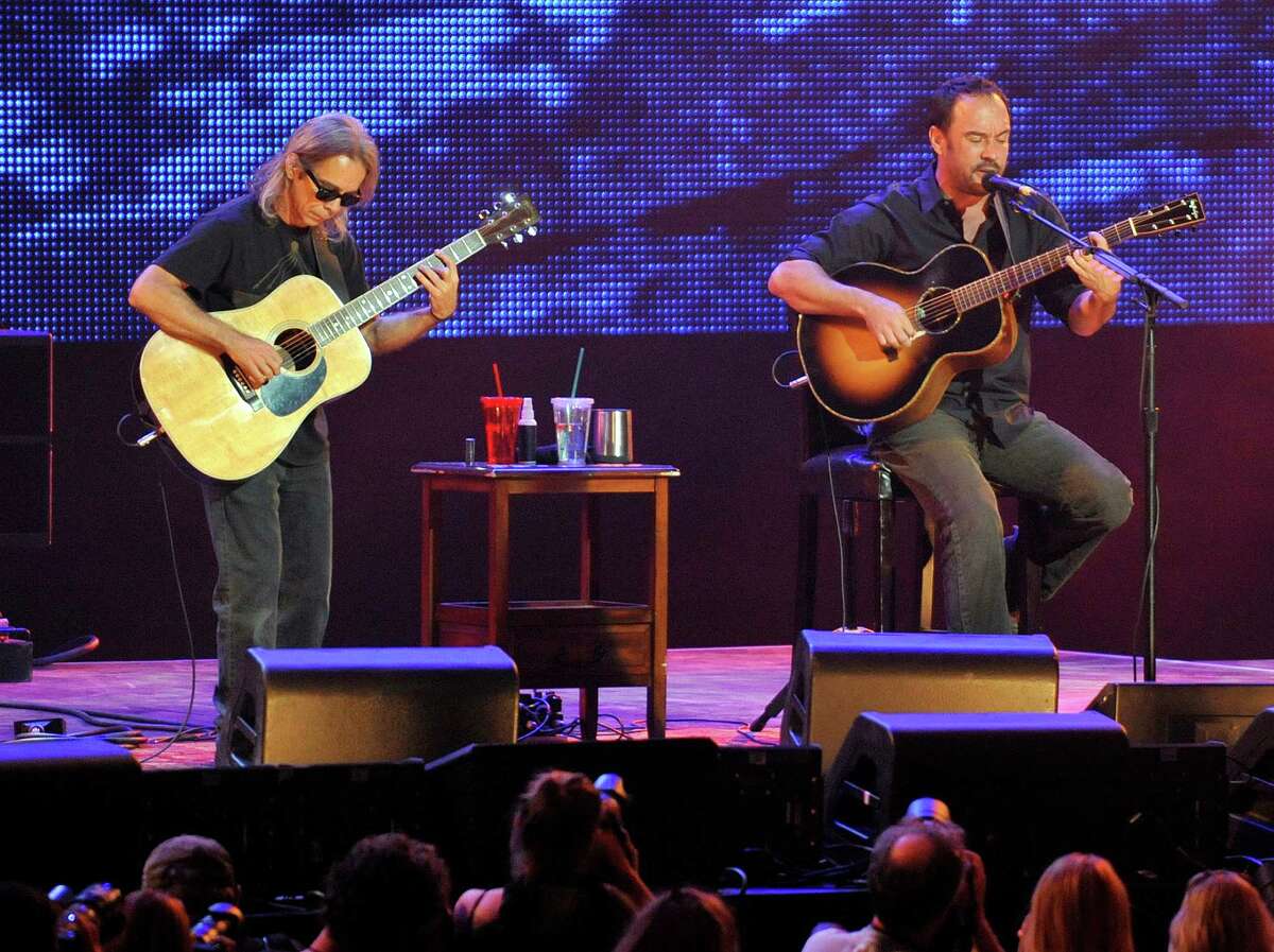Dave Matthews with Tim Reynolds performs during the Farm Aid 2013 concert at Saratoga Performing Arts Center in Saratoga Springs, N.Y., Saturday, Sept. 21, 2013.