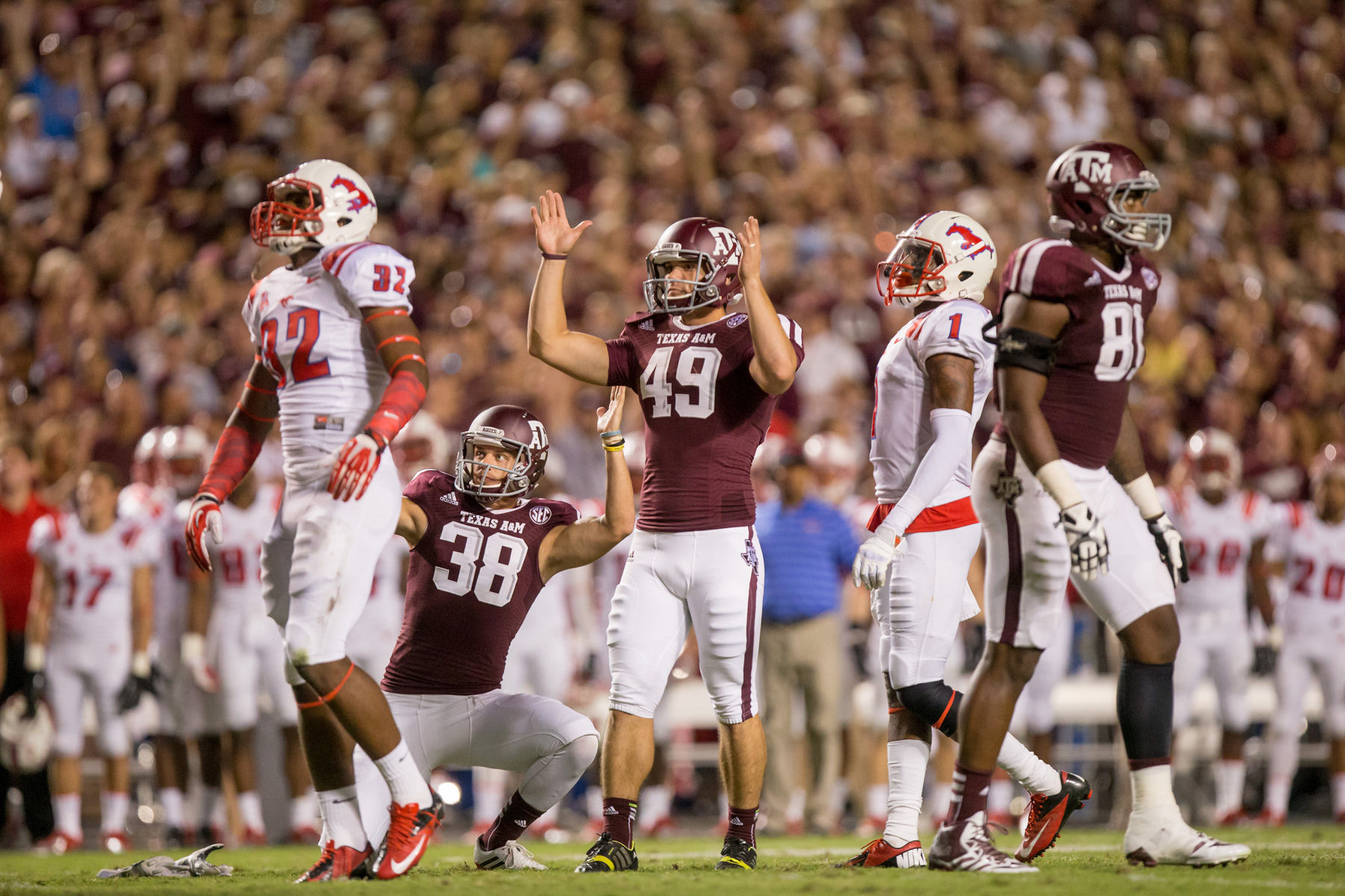 College Station, TX, USA. 26th Oct, 2013. Texas A&M punter kicker Josh Lambo  #49 warms up before NCAA football game kickoff at Kyle Field in College  Station, TX. © csm/Alamy Live News