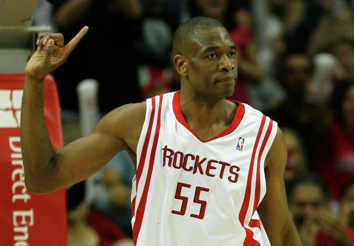 FILE ** Houston Rockets' Dikembe Mutombo (55), of Congo, is fouled