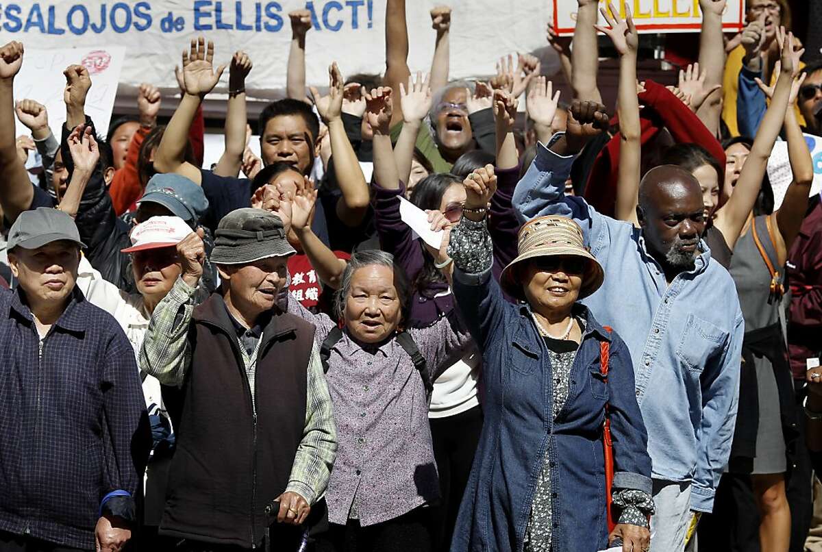 Over one hundred supporters of the Lee's and shouted against elderly evictions Wednesday September 25, 2013 in San Francisco, Calif. The Lee family has lived on Jackson Street in San Francisco for decades and now is being evicted under the Ellis Act. Friends, politicians and religious leaders gathered at their home to show their support for the elderly couple and stand against evictions of longtime residents.