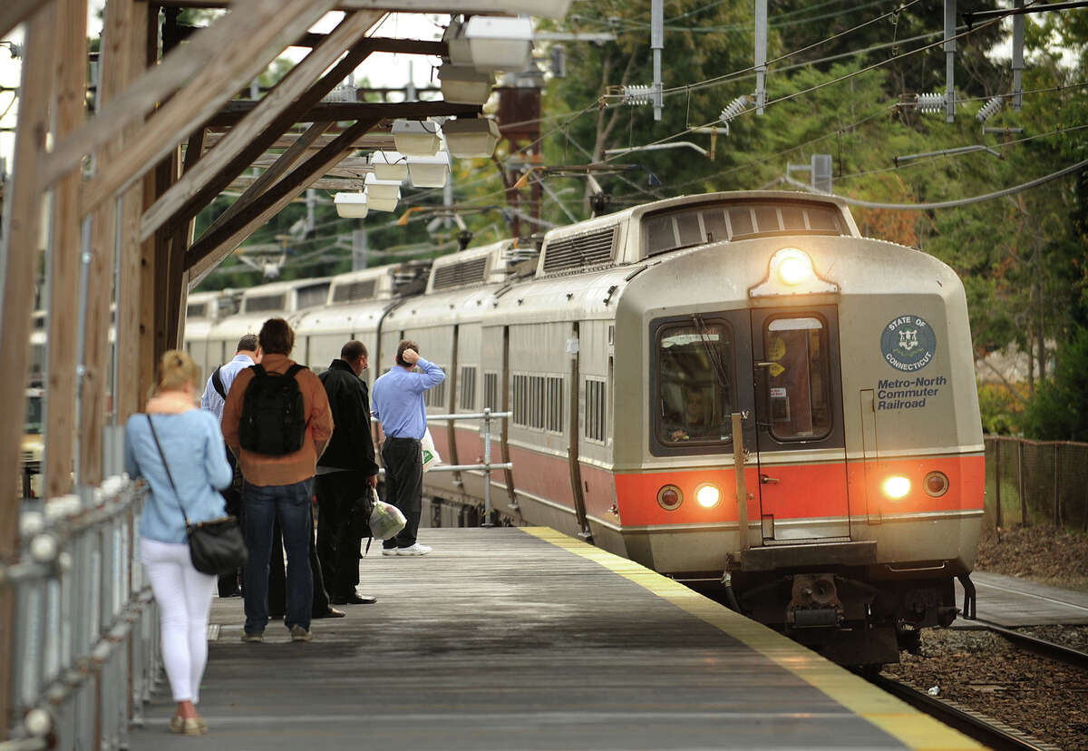 A southbound Metro North commuter train picks up morning riders at the Fairfield station on Thursday, September 26, 2013.