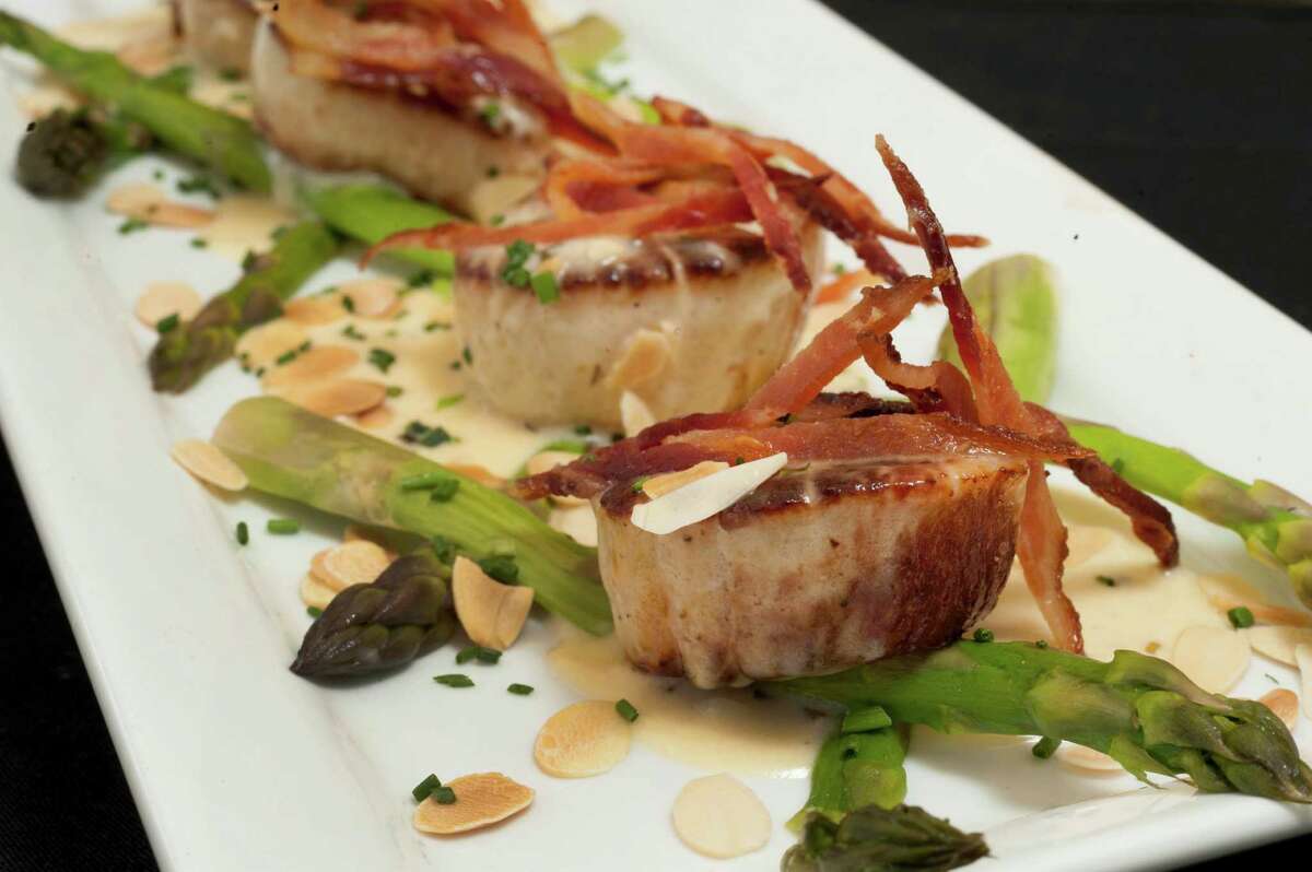 Cover 3 is a more upscale bar with a menu that goes far beyond the usual sports bar fare. These are the scallops. Tuesday, Sept. 24, 2013.