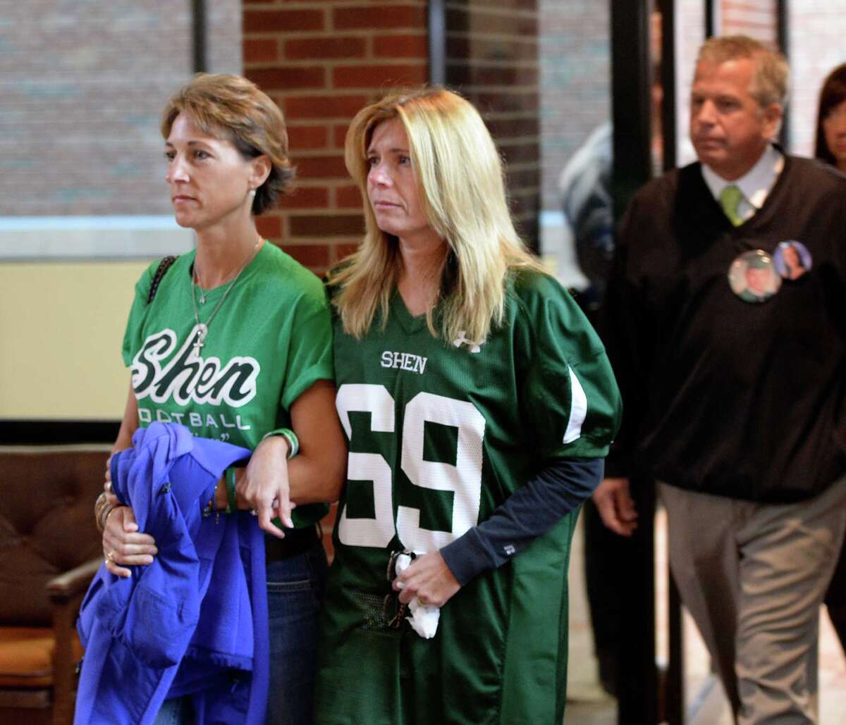 Regina Stewart, left, Chris Stewart's mother, walks into Saratoga County Courthouse with Dawn Wind, Bailey Wind's mother, on Friday Sept. 27, 2013 in Saratoga County Court in Ballston Spa, N.Y. to hear the plea that was taken by Dennis Drue. Chris Stewart was killed and Bailey Wind critically injured in the crash. (Skip Dickstein/Times Union)
