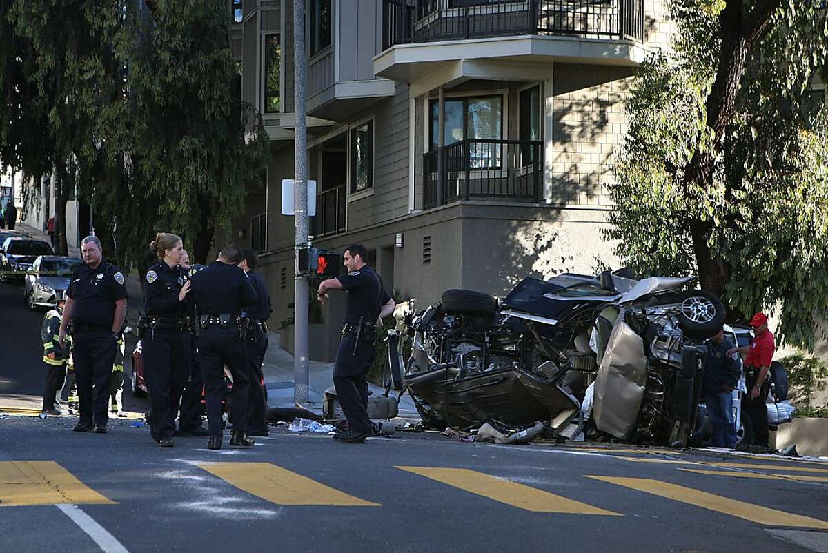 Woman arrested after car hits minivan, killing boy