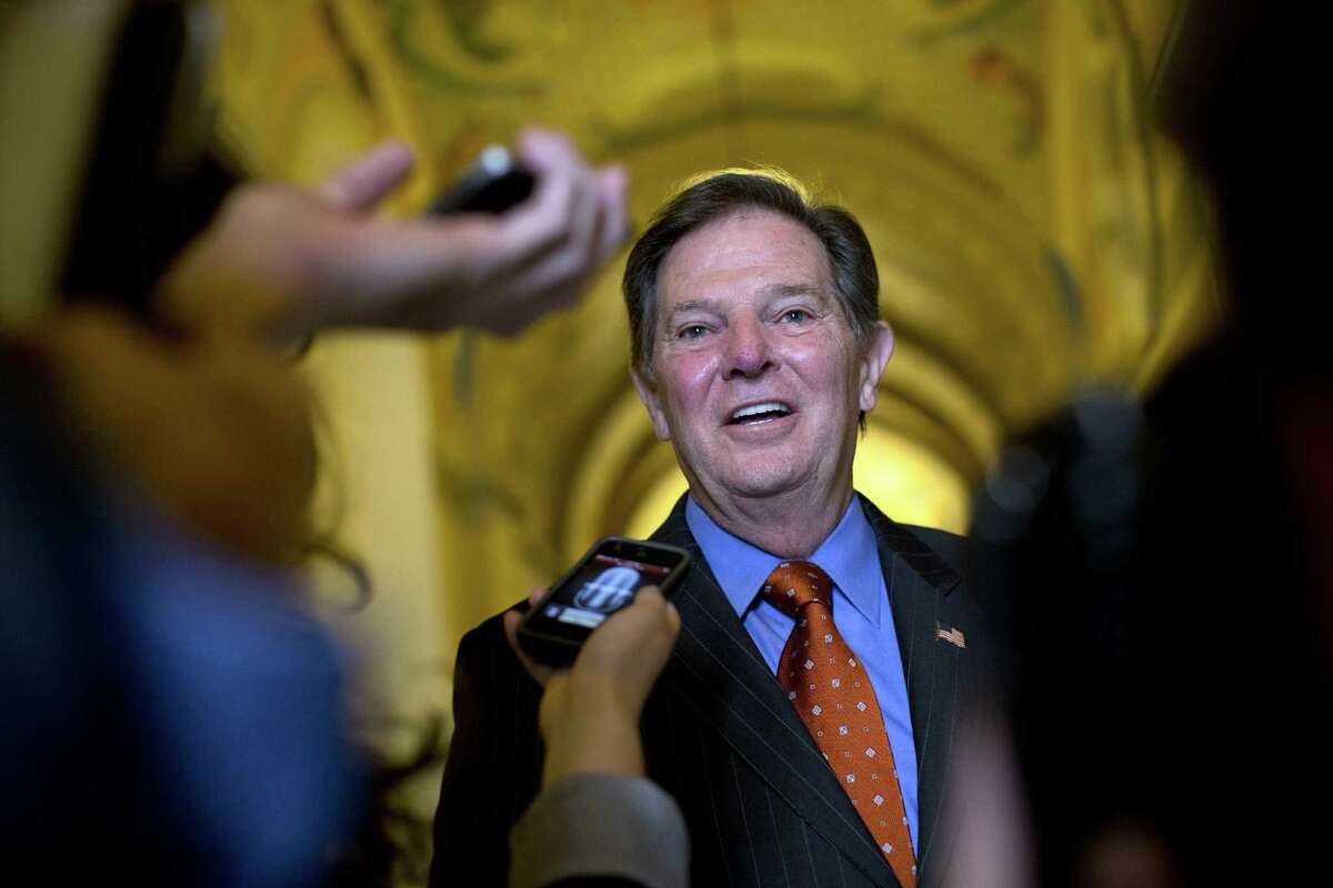 Former House Majority Leader Tom DeLay talks to reporters as he leaves a lunch meeting last week on Capitol Hill in Washington. A Texas appeals court tossed the criminal conviction of DeLay on Sept. 19, saying there was insufficient evidence for a jury in 2010 to have found him guilty of illegally funneling money to Republican candidates. A reader expresses his pleasure with the ruling.
