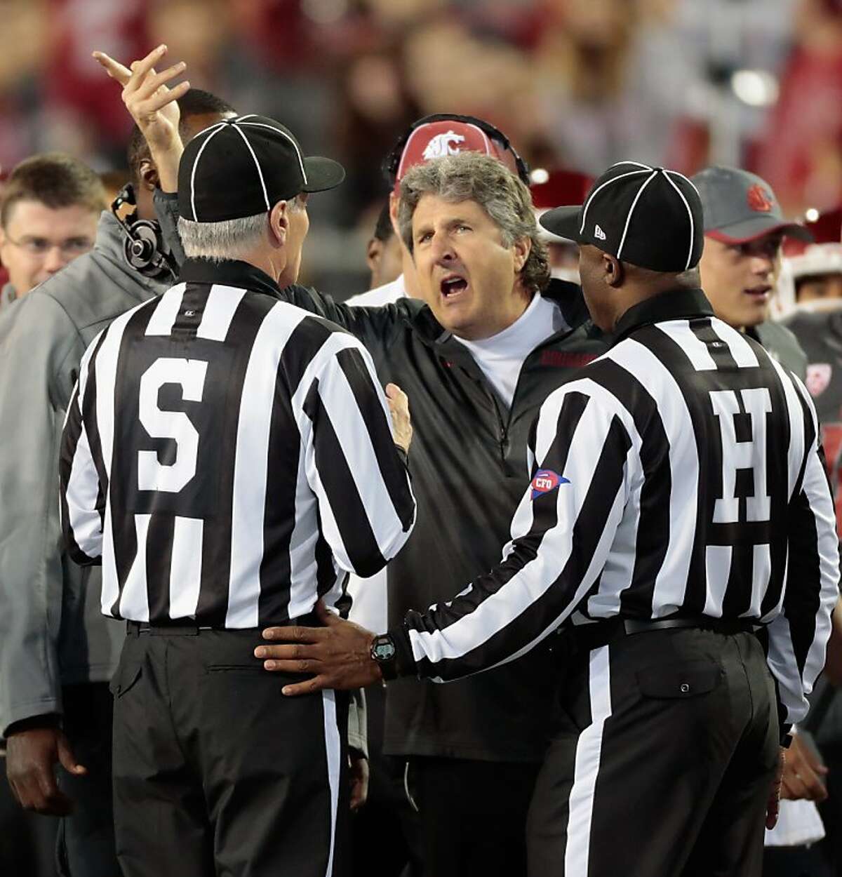 PULLMAN, WA - SEPTEMBER 21: Head coach Mike Leach of the Washington State Cougars disputes a call during the game against the Idaho Vandals at Martin Stadium on September 21, 2013 in Pullman, Washington. (Photo by William Mancebo/Getty Images)