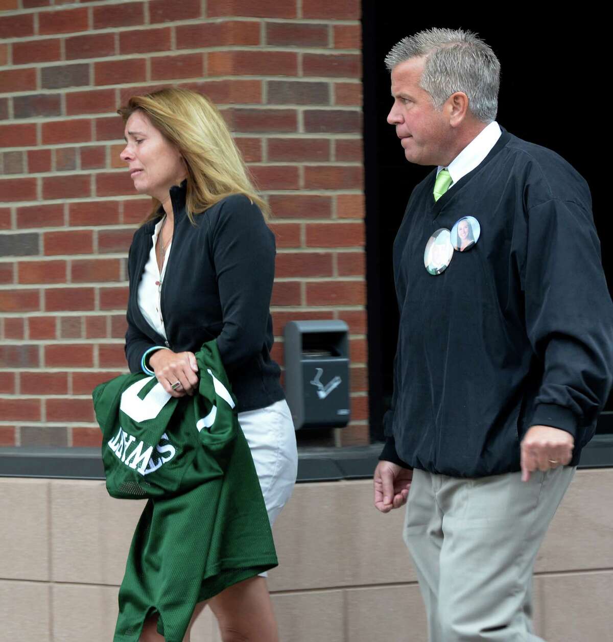 Dawn Wind, visibly emotional, left heads to District Attorney James Murphy's office Friday morning Sept 27, 2013 in Ballston Spa, N.Y. before Dennis Drue took a plea deal in Saratoga County Court. (Skip Dickstein/Times Union)