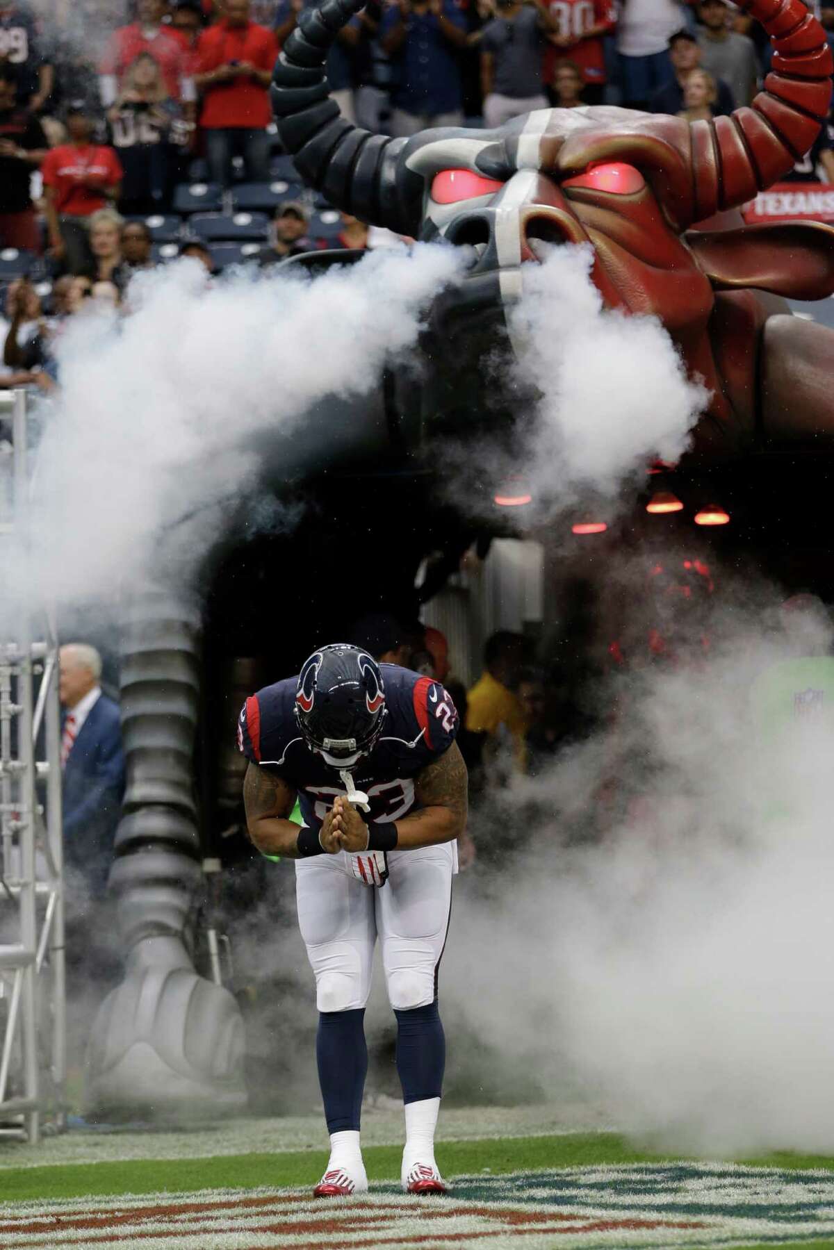 Houston Texans running back Arian Foster (23) is introduces before an NFL football game against the Seattle Seahawks Sunday, Sept. 29, 2013, in Houston. (AP Photo/David J. Phillip)