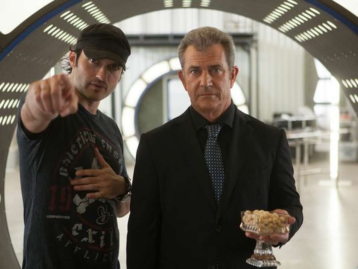 San Antonio's own Robert Rodriguez directs Mel Gibson, who plays a James Bond-style villain, in 'Machete.'