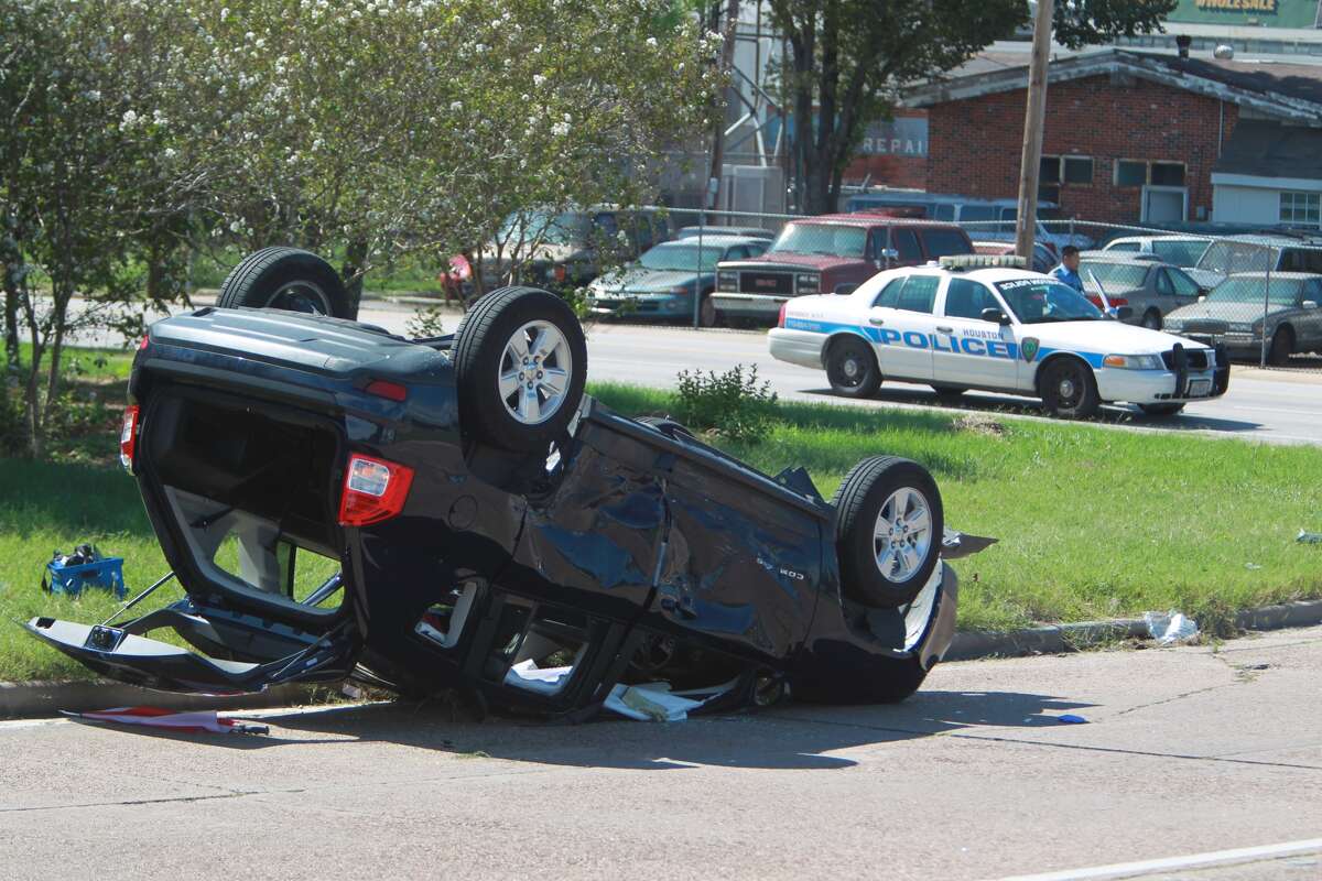 Accident in downtown Houston flips Jeep, sends passengers to hospital