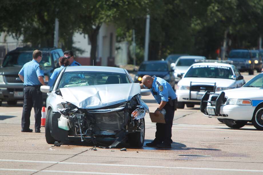 Accident in downtown Houston flips Jeep, sends passengers to hospital