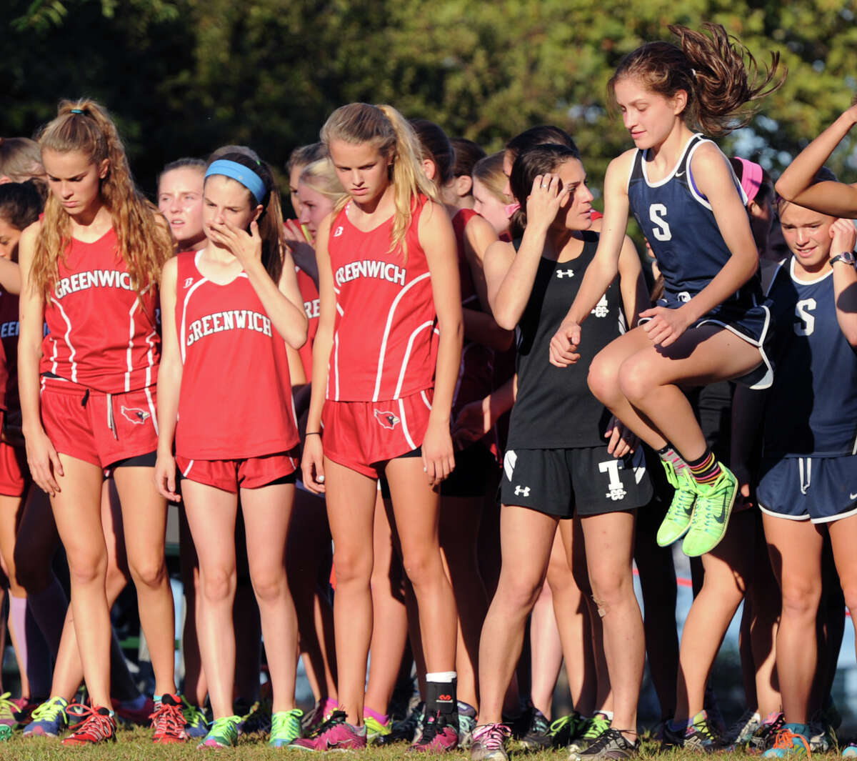 Greenwich High girls cross country running past the opposition