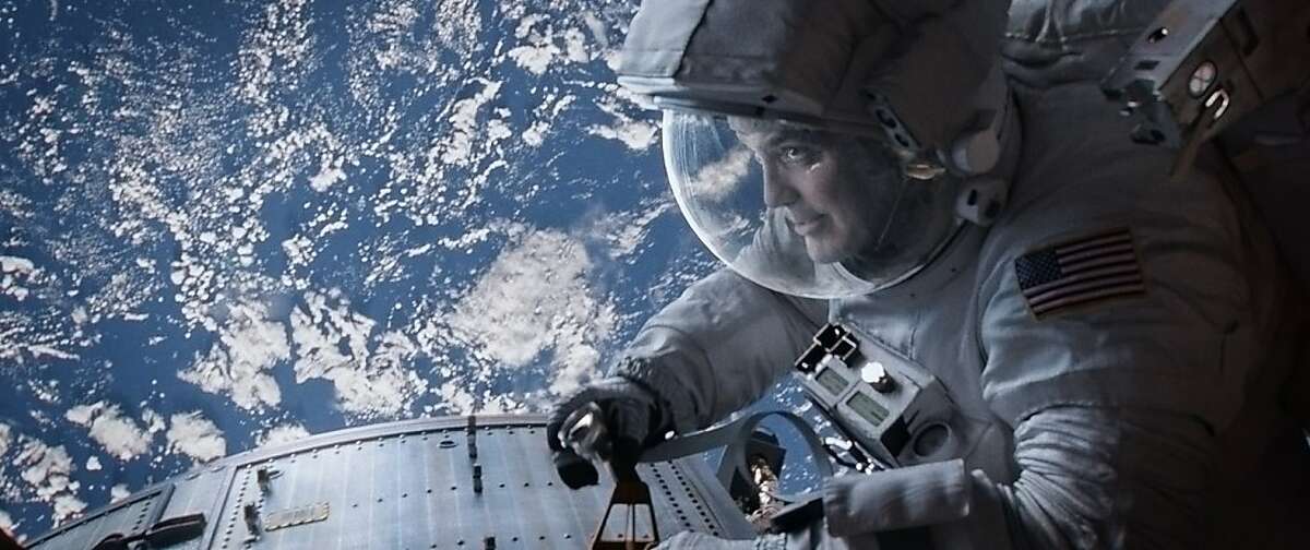 GEORGE CLOONEY as Matt Kowalski in Warner Bros. Pictures' dramatic thriller "GRAVITY," a Warner Bros. Pictures release.