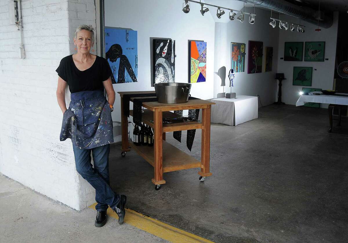 Artist Chris Silkwood stands by her space at the Winter Street Studios Tuesday Oct. 01,2013.(Dave Rossman photo)
