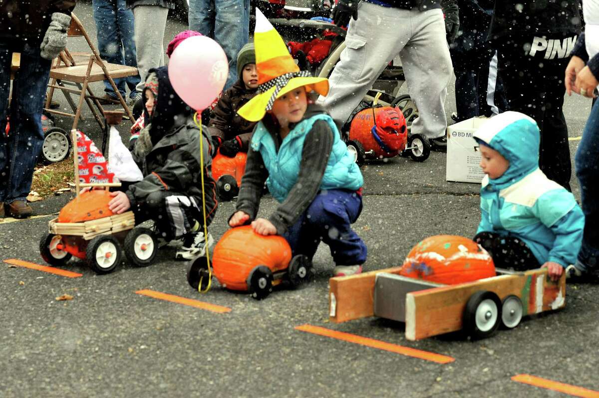 Gabby Jimenez, 7, of Newtown, checks out her competition at the start of the Great Pumpkin Race in Newtown on Saturday, Oct. 29, 2011. The year's Great Pumpkin Race will be Saturday, Oct. 19, behind Edmond Town Hall.