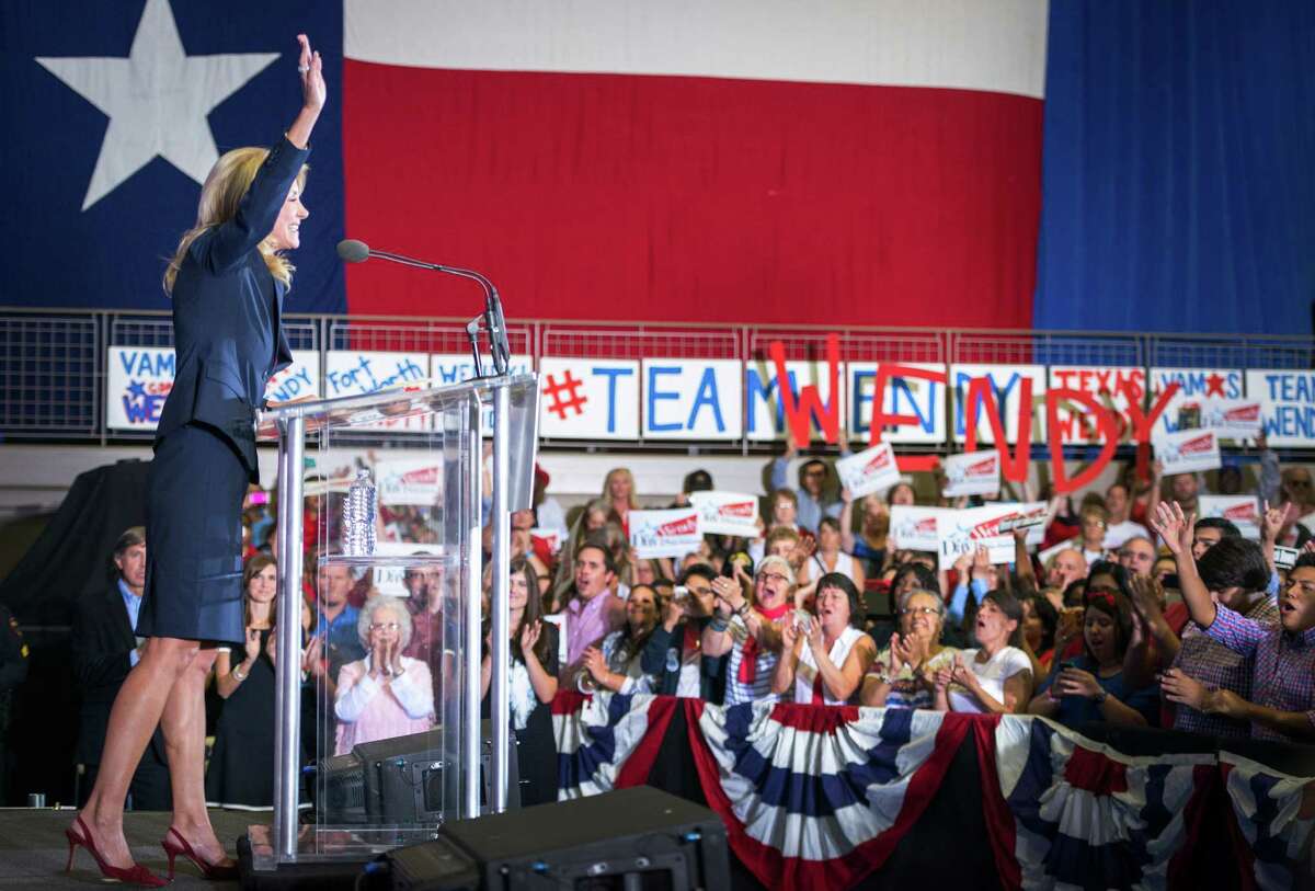 State Sen. Wendy Davis waves to supporters after announcing her candidacy for Texas governor at Wiley G. Thomas Coliseum in Haltom City on Thursday, October 3, 2013.