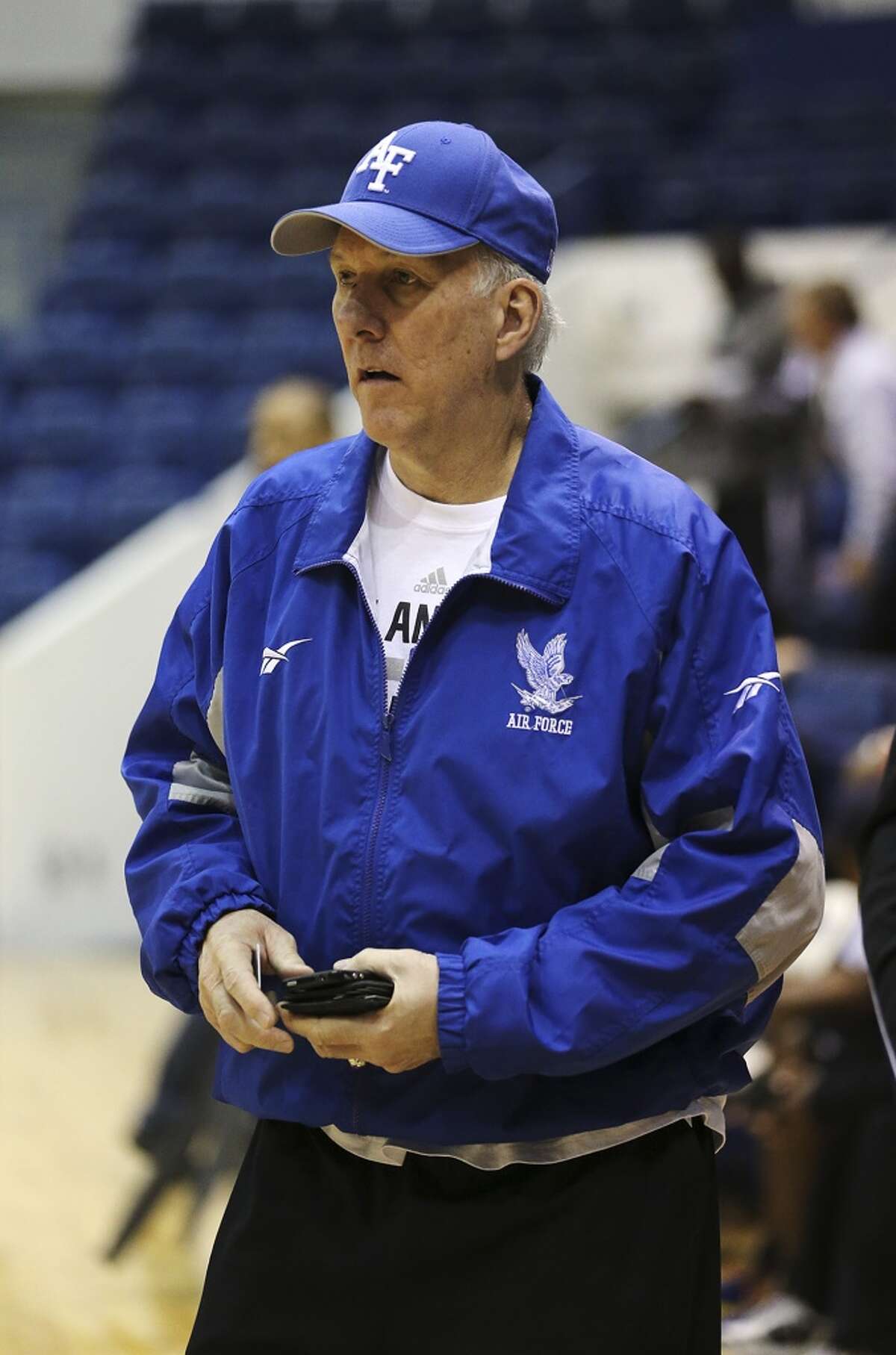 FILE PHOTO: San Antonio Spurs Head Coach Gregg Popovich sports Air Force swag at the United State Air Force Academy in 2013. 