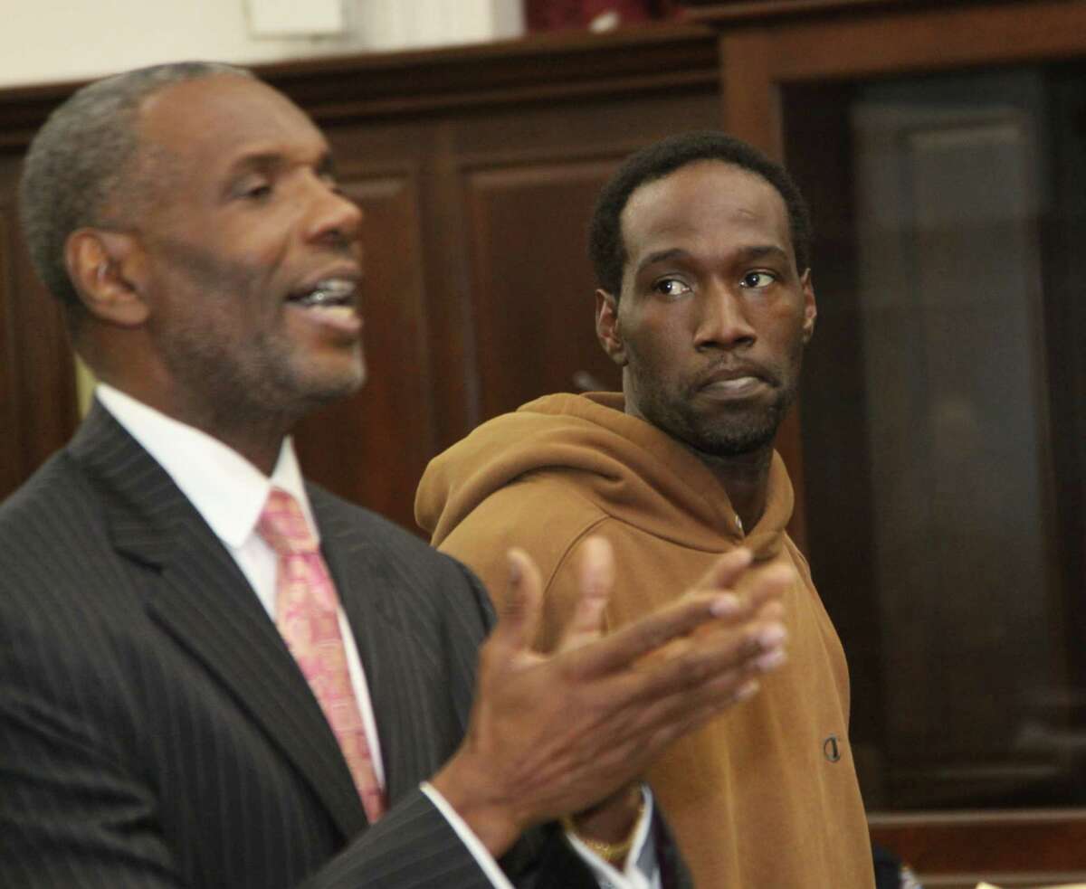 Reginald Chance, a motorcyclist accused of triggering a bloody confrontation between bikers and an SUV driver in New York City, during his arraignment on gang assault charges in New York, Sunday, Oct. 6, 2013. At left is Chance's attorney, Gregory Watts. (John Marshall Mantel/The New York Times) ORG XMIT: NYT3