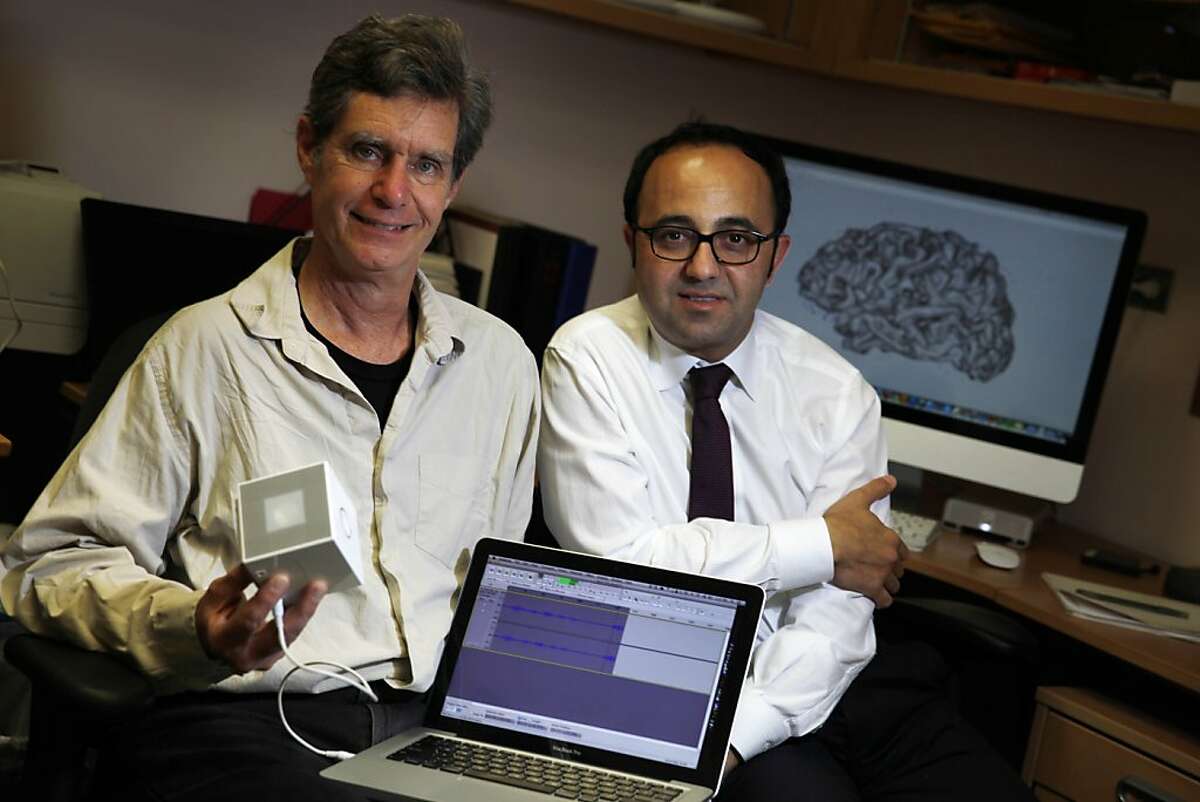 Chris Chafe (l to r), Duca Family professor; Director of Center for Computer Research in Music and Acoustics; Stanford professor of music and Josef Parvizi, associate professor Department of Neurology and Neurological Sciences; director, Stanford Program for Drug-Resistant Epilepsies; director Stanford Human Intercranial Cognitive Electrophysiology Program are seen in a lab at Stanford Hospital on Monday, September 30, 2013 in Stanford, Calif. Parvizi and Chafe have transformed recorded brain activity in a seizure state to music.