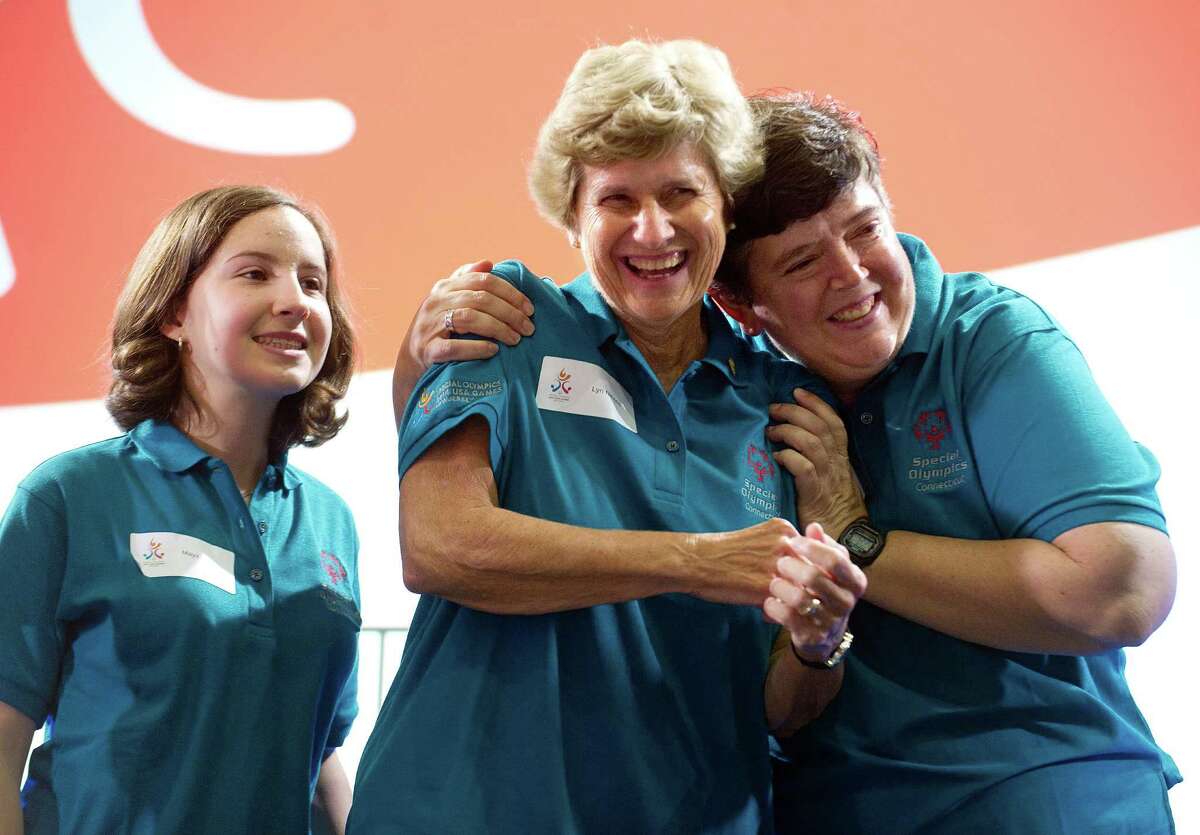 From left, unified tennis team members Maya Todrin of Stamford, Lyn Nevins of Darien, center, and Grace Knechtle of New Canaan, right, are introduced during the Special Olympics 2014 team Connecticut announcement at Chelsea Piers in Stamford, Conn., on Tuesday, October 9, 2013.