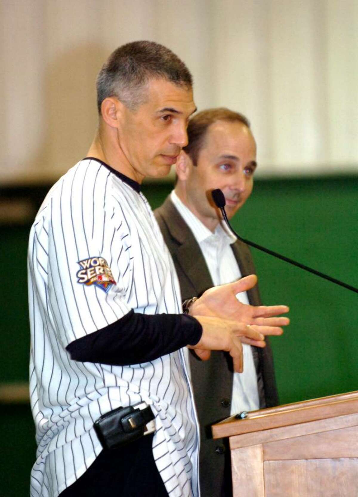 New York Yankees' Manager Joe Girardi and general manager Brian Cashman speak the Convent of the Sacred Heart's celebration of the Yankees 2009 World Series championship on January 26, 2010.