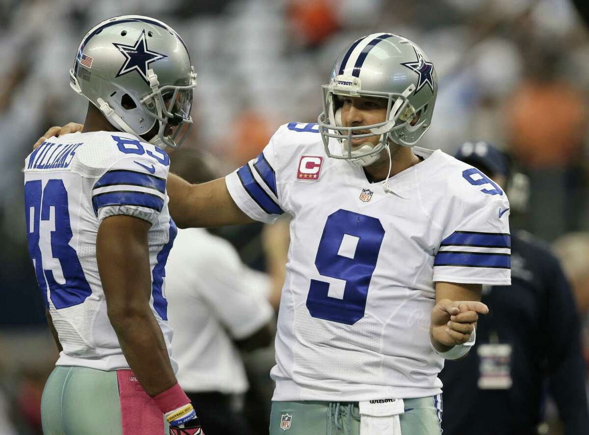 Dallas Cowboys Tony Romo gets set to throw a pass in the 3rd