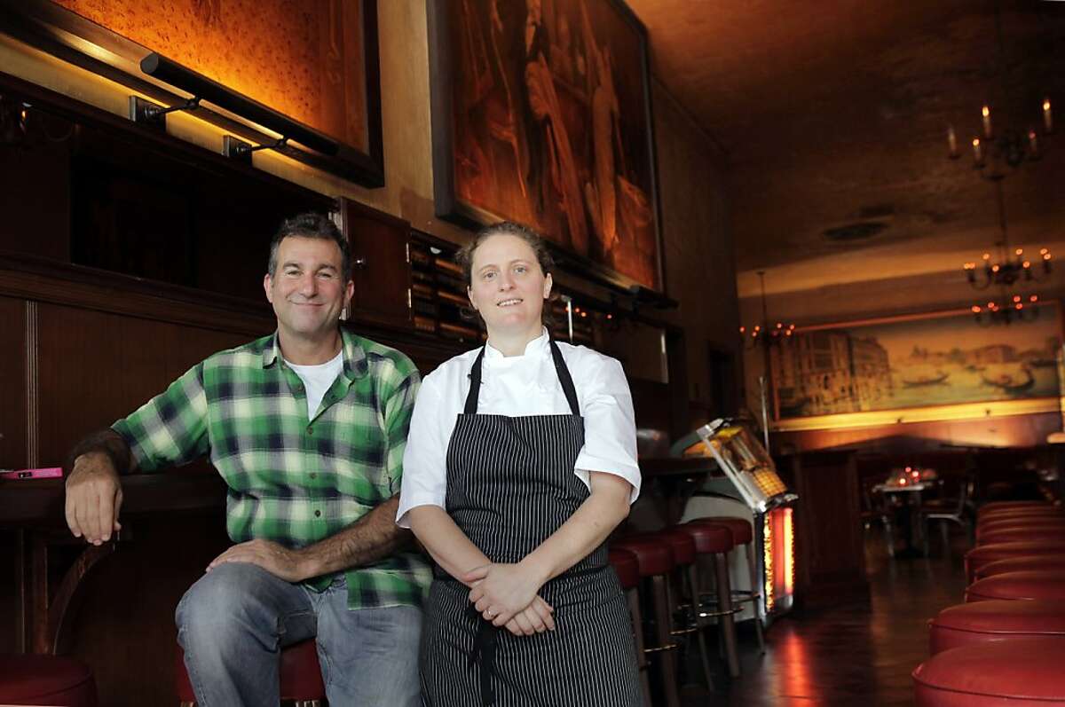Ken Friedman, left, and April Bloomfield hope to reinvigorate business at Tosca with a new kitchen at the historic establishment. San Francisco's legendary Tosca is set to reopen this week under new ownership, featuring a restaurant as well as the bar. April Bloomfield of Spotted Pig helms the dining, and Co-owner Ken Friedman hopes the changes will bring back regulars and a new crowd. The San Francisco, Calif., mainstay is seen here on Monday, October 7, 2013.