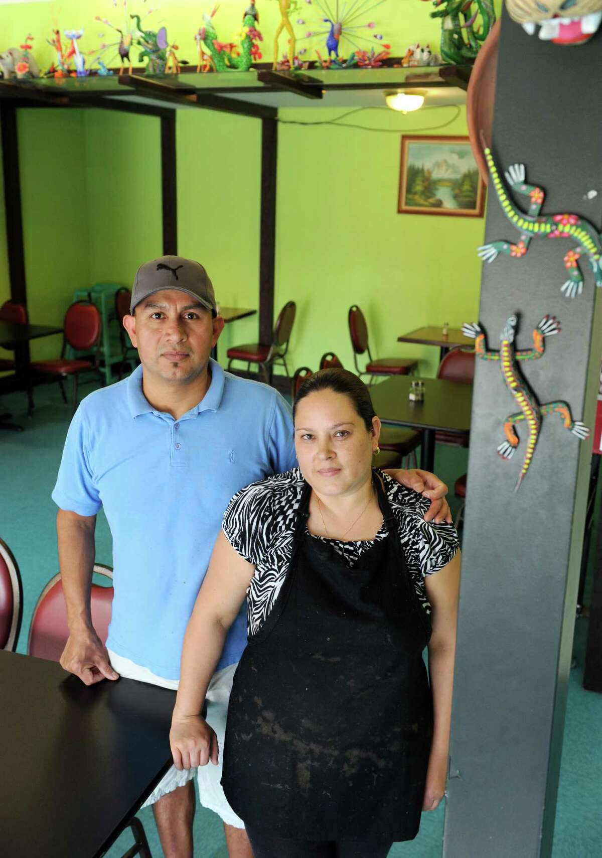 Everardo Sosa-Mendoza and his wife, Maria Sosa owners of La Mexicana restaurant and grocery store on Tuesday Oct. 1, 2013 in Schenectady, N.Y. (Michael P. Farrell/Times Union)