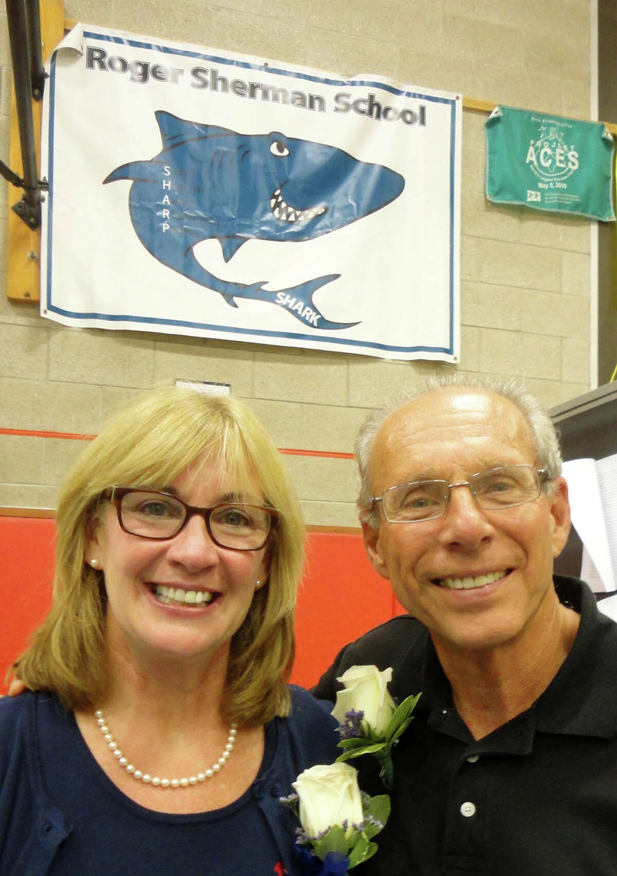 Sherman School Principal Eileen Roxbee poses with former Principal Mike Giarratano, who was the school's top administrator from 1995 to 2006. FAIRFIELD CITIZEN, CT 10/11/13